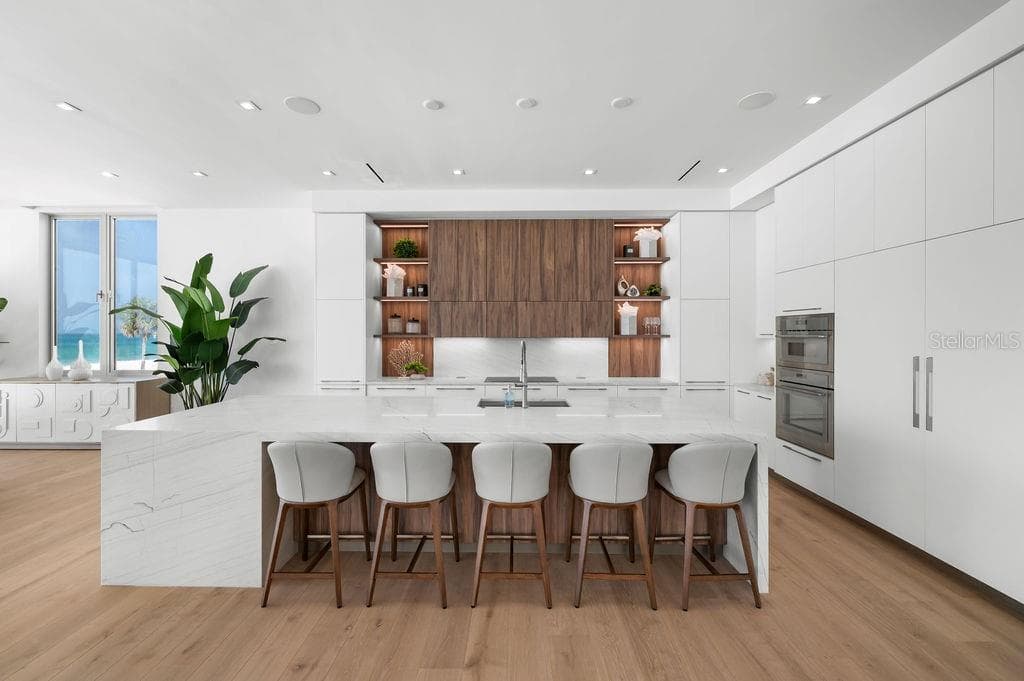 Kitchen is designed with solid wood Italian cabinetry - 6489 GULFSIDE RD, LONGBOAT KEY
