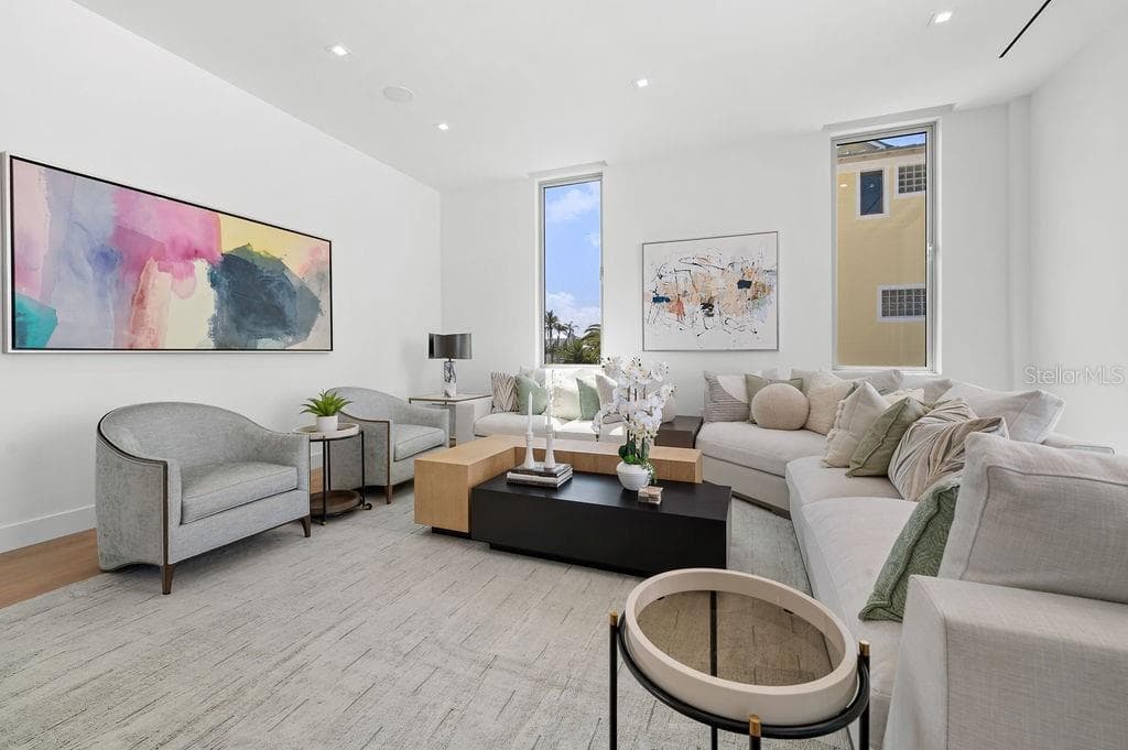 Second living space can be used as a club room or additional gathering space adjacent to the Summer kitchen - 6489 GULFSIDE RD, LONGBOAT KEY