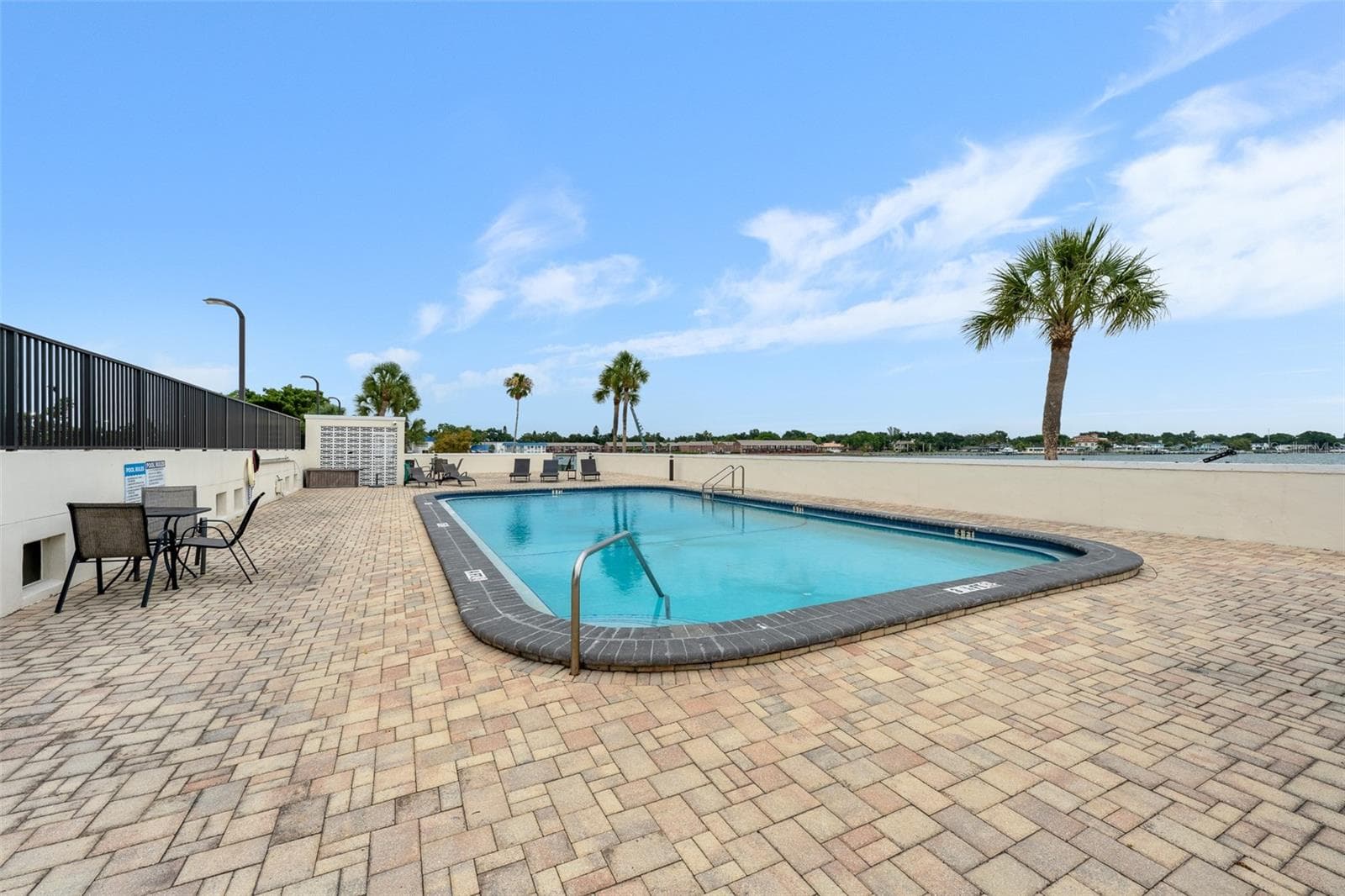 Bay-side heated community pool at Bridgeton Condominiums on Tampa Bay. - 7100 SUNSHINE SKYWAY LN S #701, ST PETERSBURG