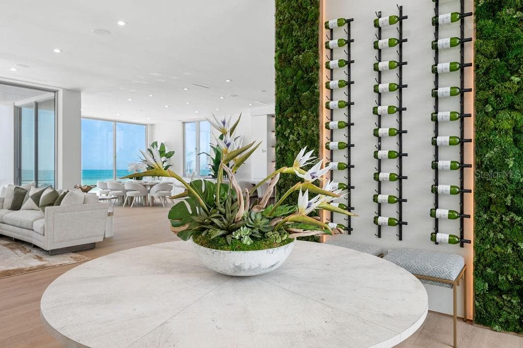 Biophyllic green wall greets you off the elevator as you enter the second floor - 6489 GULFSIDE RD, LONGBOAT KEY
