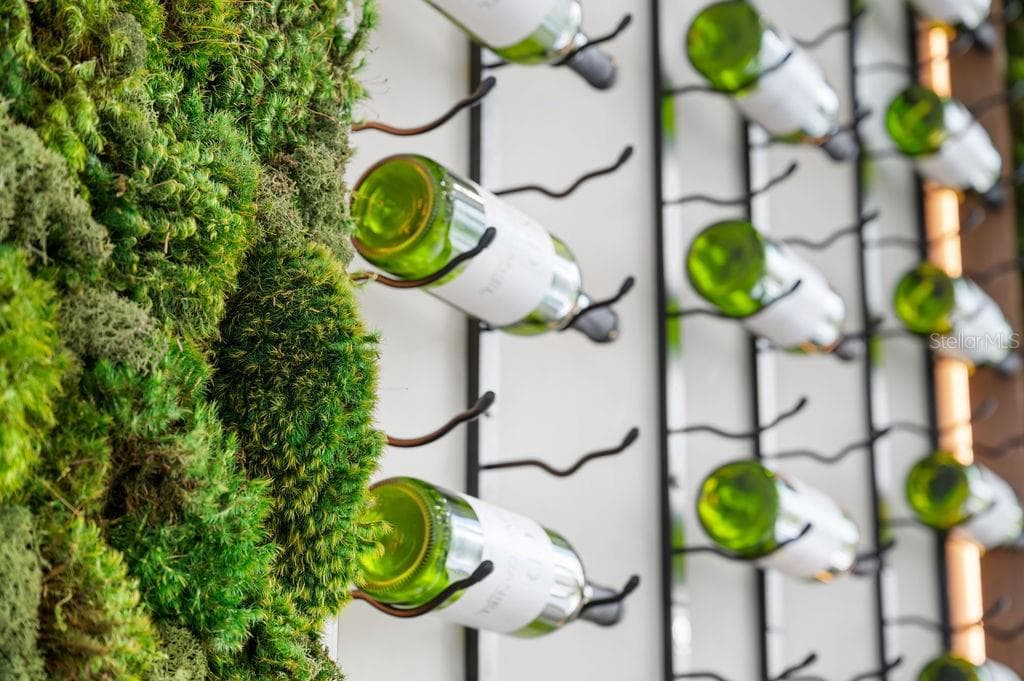 Biophyllic greenwall and wine display, complete with Thermador™ wine tower - 6489 GULFSIDE RD, LONGBOAT KEY