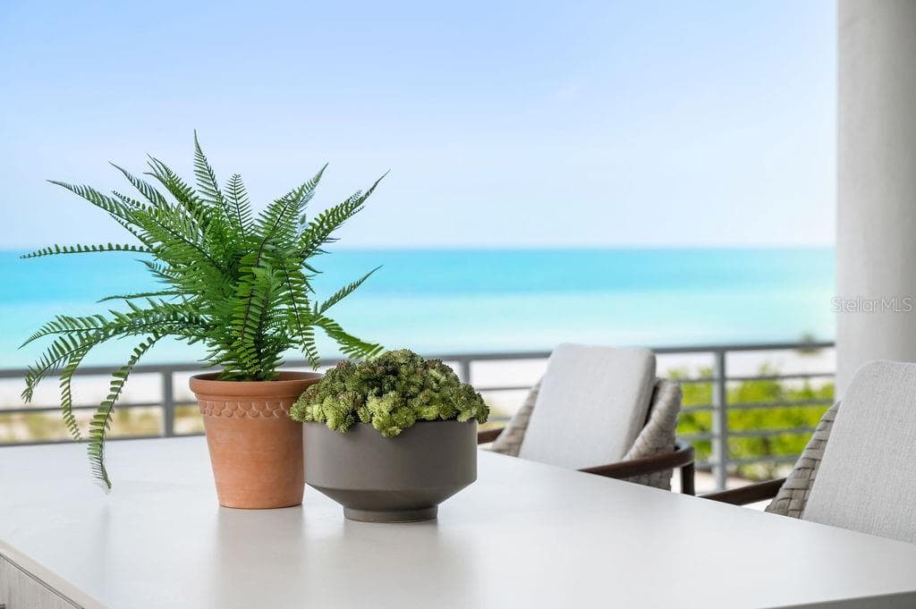 Enjoy your Summer kitchen on the 40 foot terrace with steps down to the pool and beach - 6489 GULFSIDE RD, LONGBOAT KEY