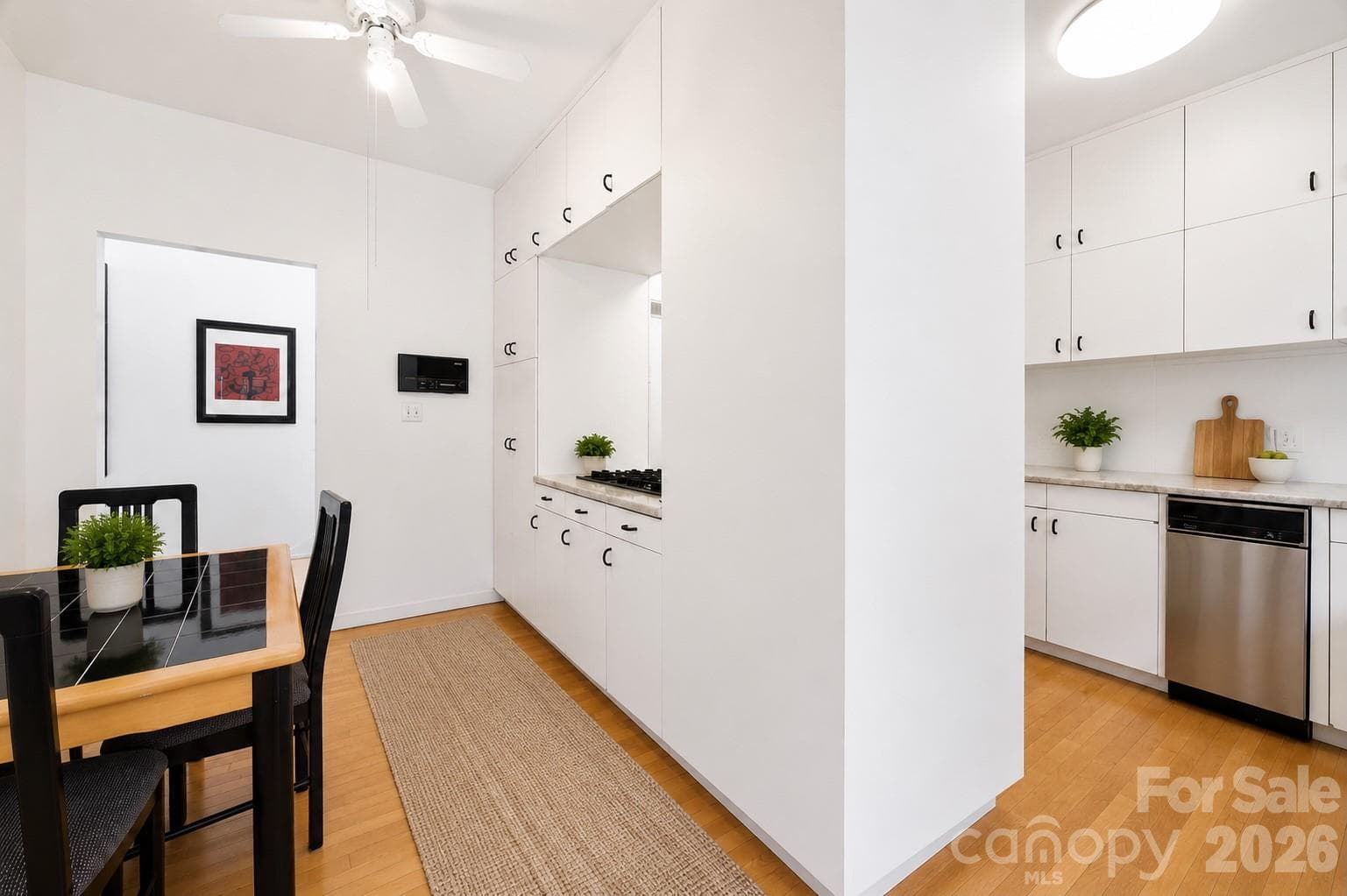 Comfortable eat-in dining area thoughtfully integrated into the kitchen layout - Charlotte