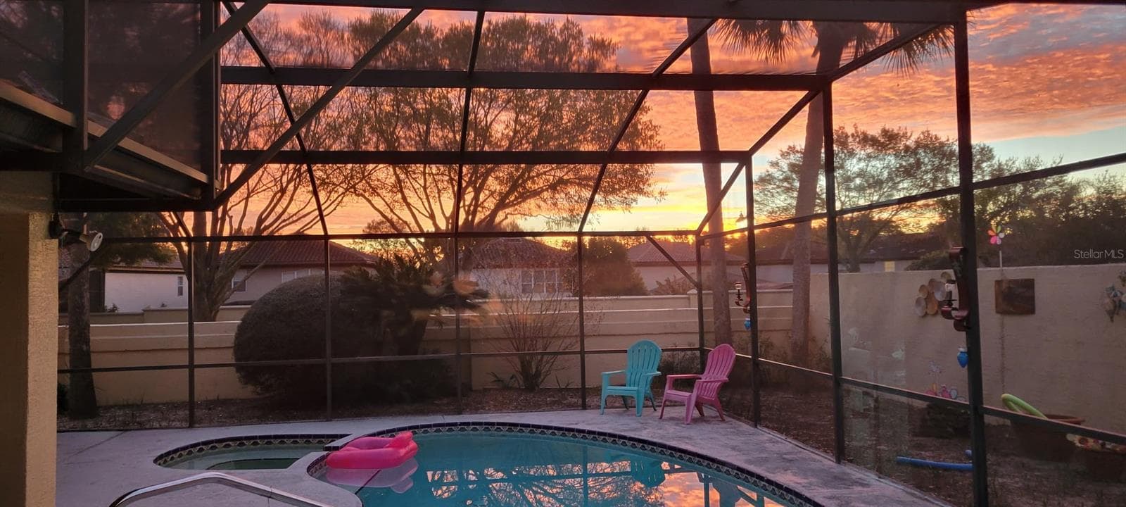 Sunrise from primary bedroom - 8215 ROLLA CT, ORLANDO
