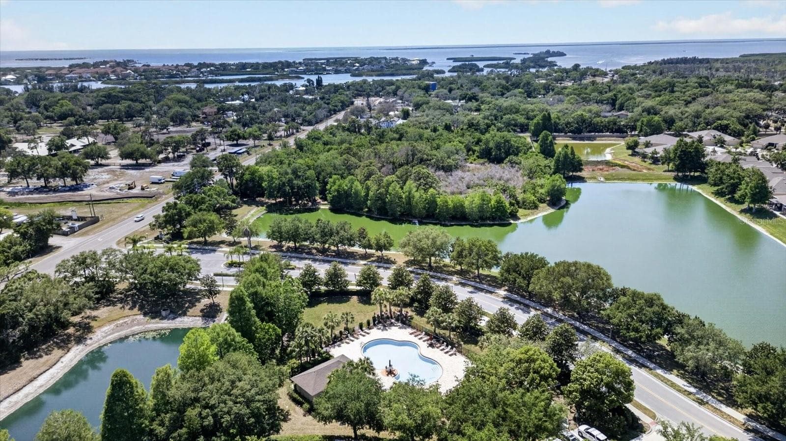 Aerial view highlighting Gulfwinds community ponds and surrounding green space. - 2153 BARRACUDA CT, HOLIDAY