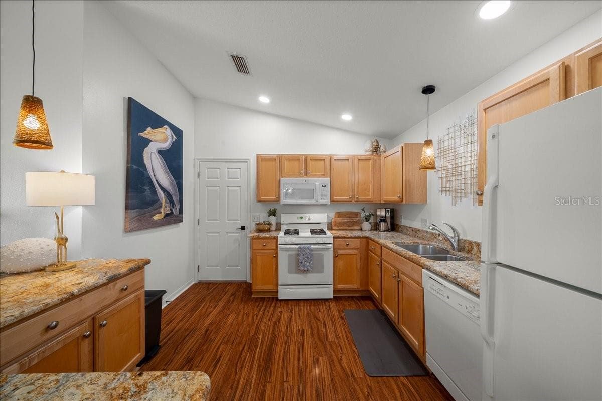 Kitchen Connects to Garage - VILLAGES OF SUMTER, THE VILLAGES
