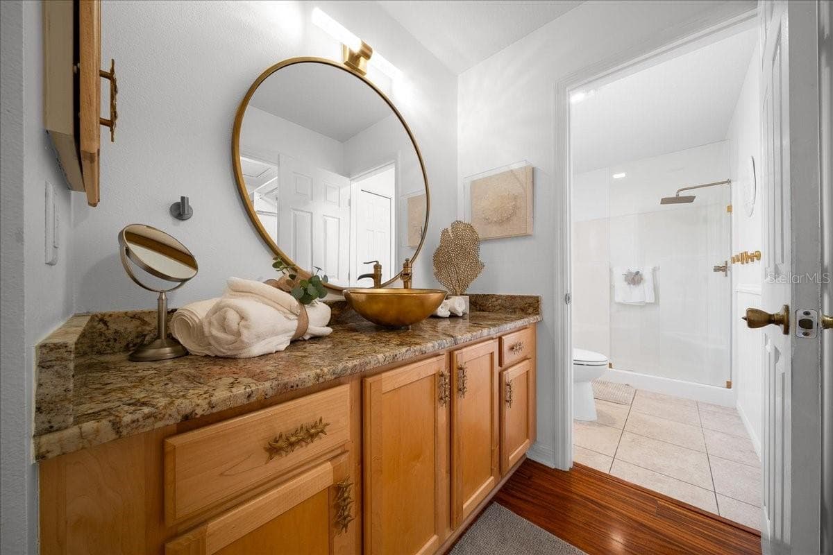 Primary Bathroom Features Updated Mirror, Faucet, and Handles - VILLAGES OF SUMTER, THE VILLAGES