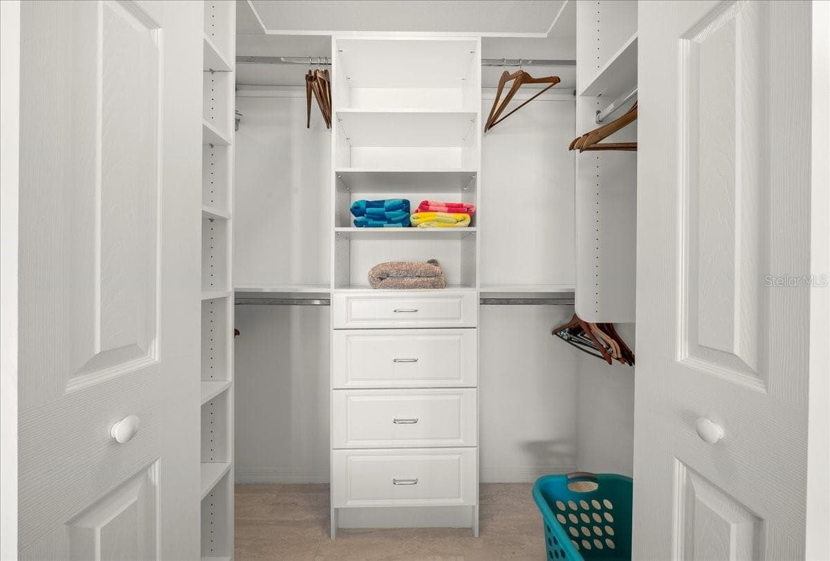 Guest Bedroom Closet - VILLAGES OF SUMTER, THE VILLAGES