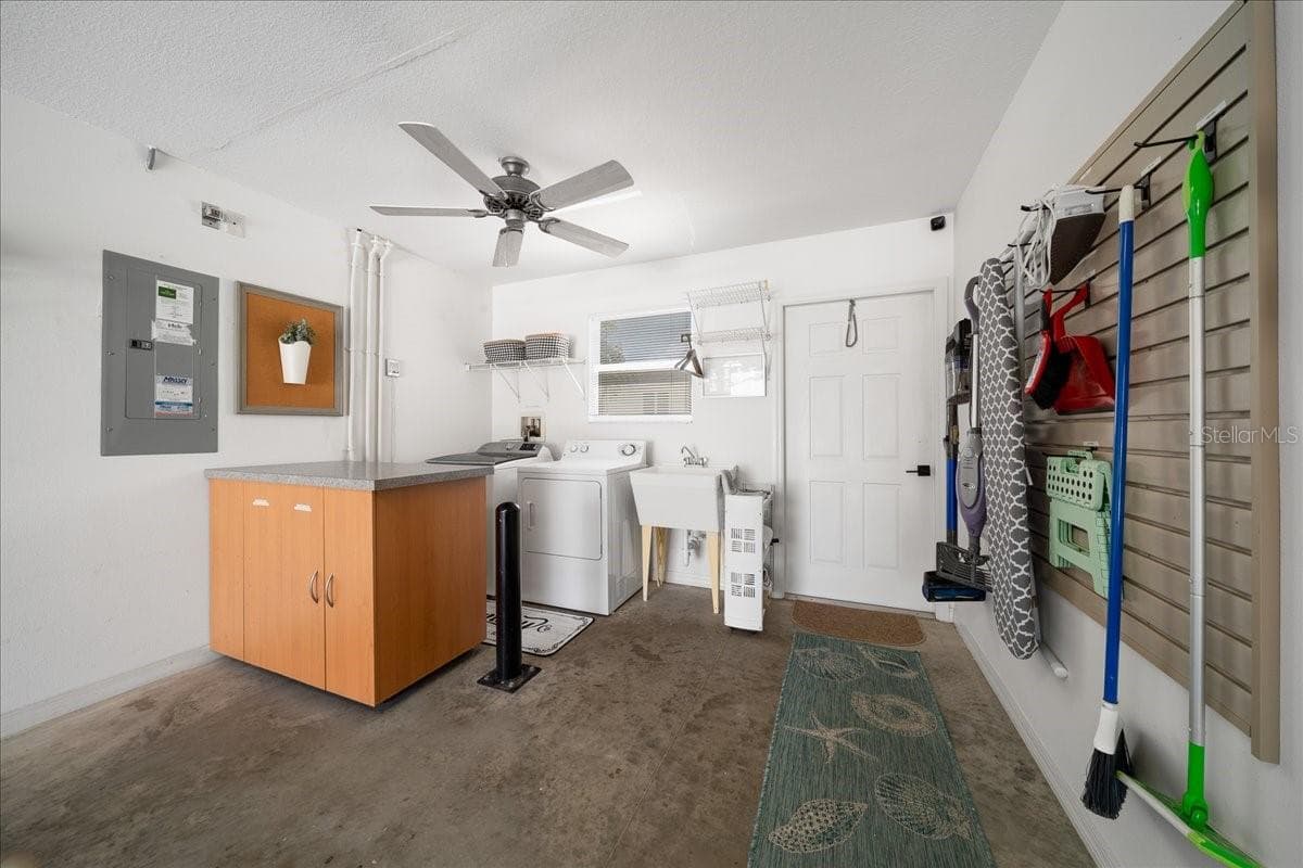 A Place for Everything with Wall Mounted Organizer and Additional Cabinet Space - VILLAGES OF SUMTER, THE VILLAGES