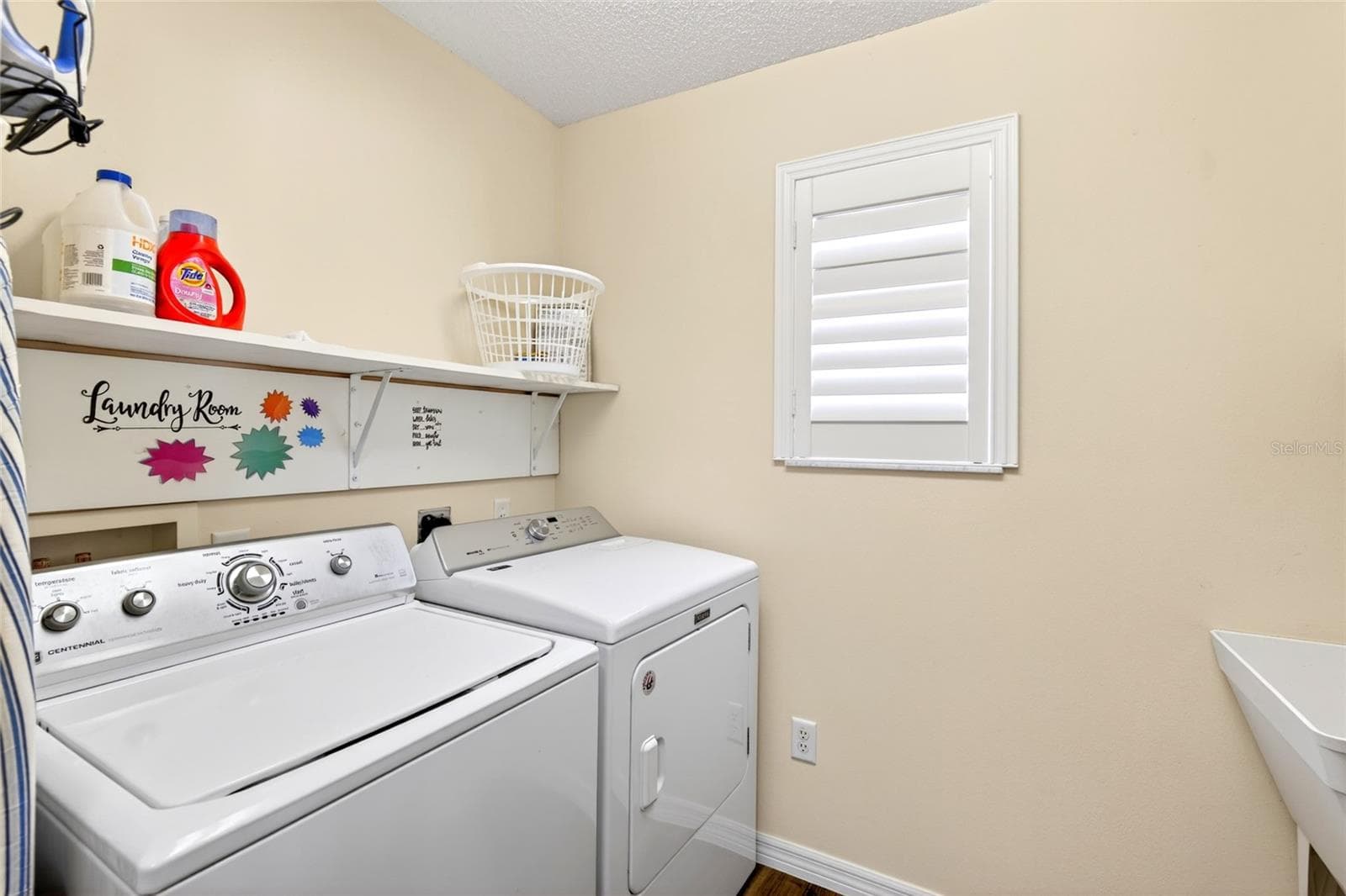 Laundry room with storage - 600 AUDREY LN, THE VILLAGES