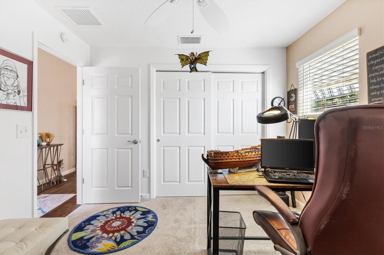 Bedroom 3 with built in closet. Used as an office in this home. - 1773 BLACKWELL LN, THE VILLAGES