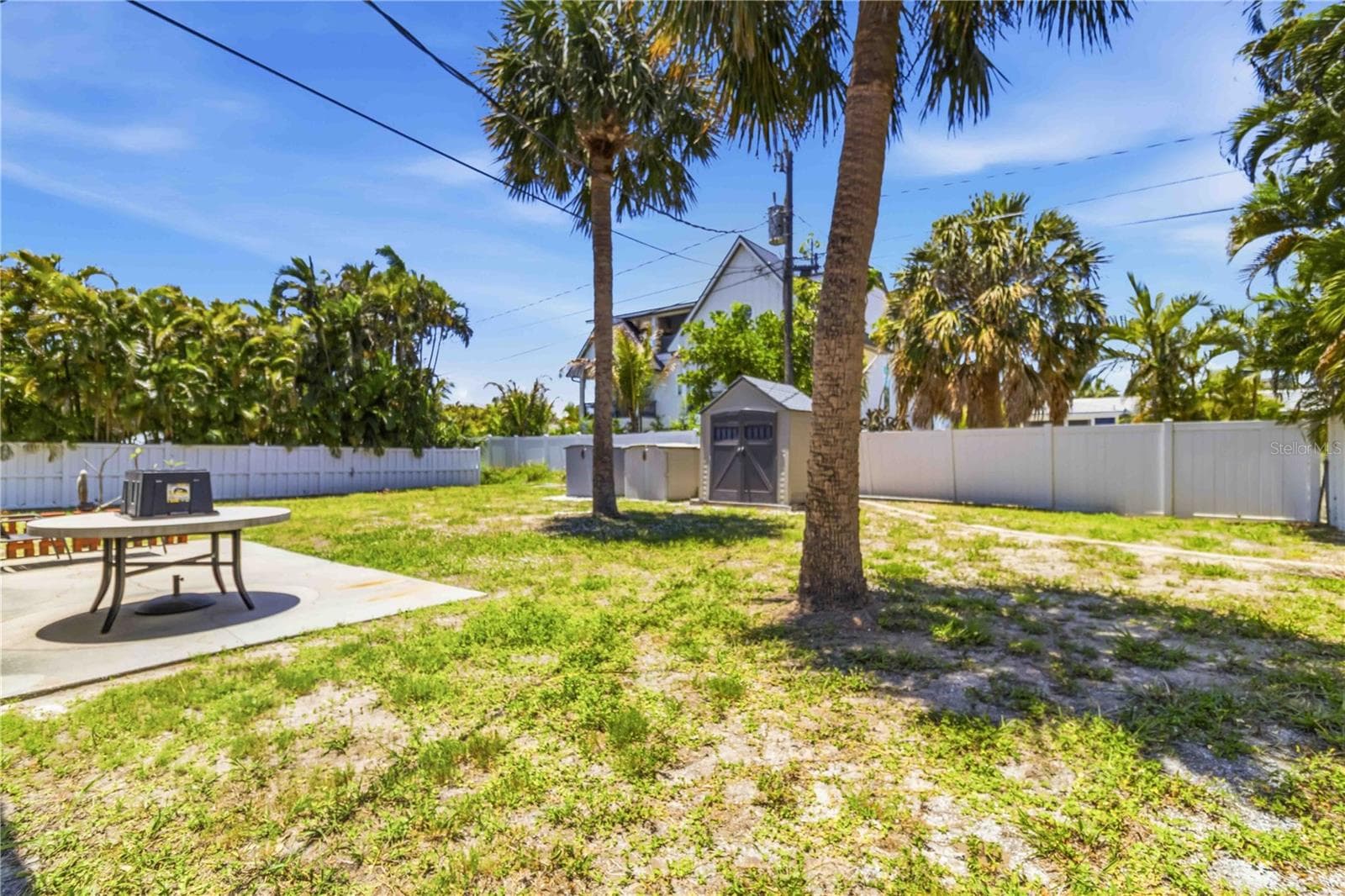 Backyard with 3 sheds for storage - 306 PALM AVE, ANNA MARIA
