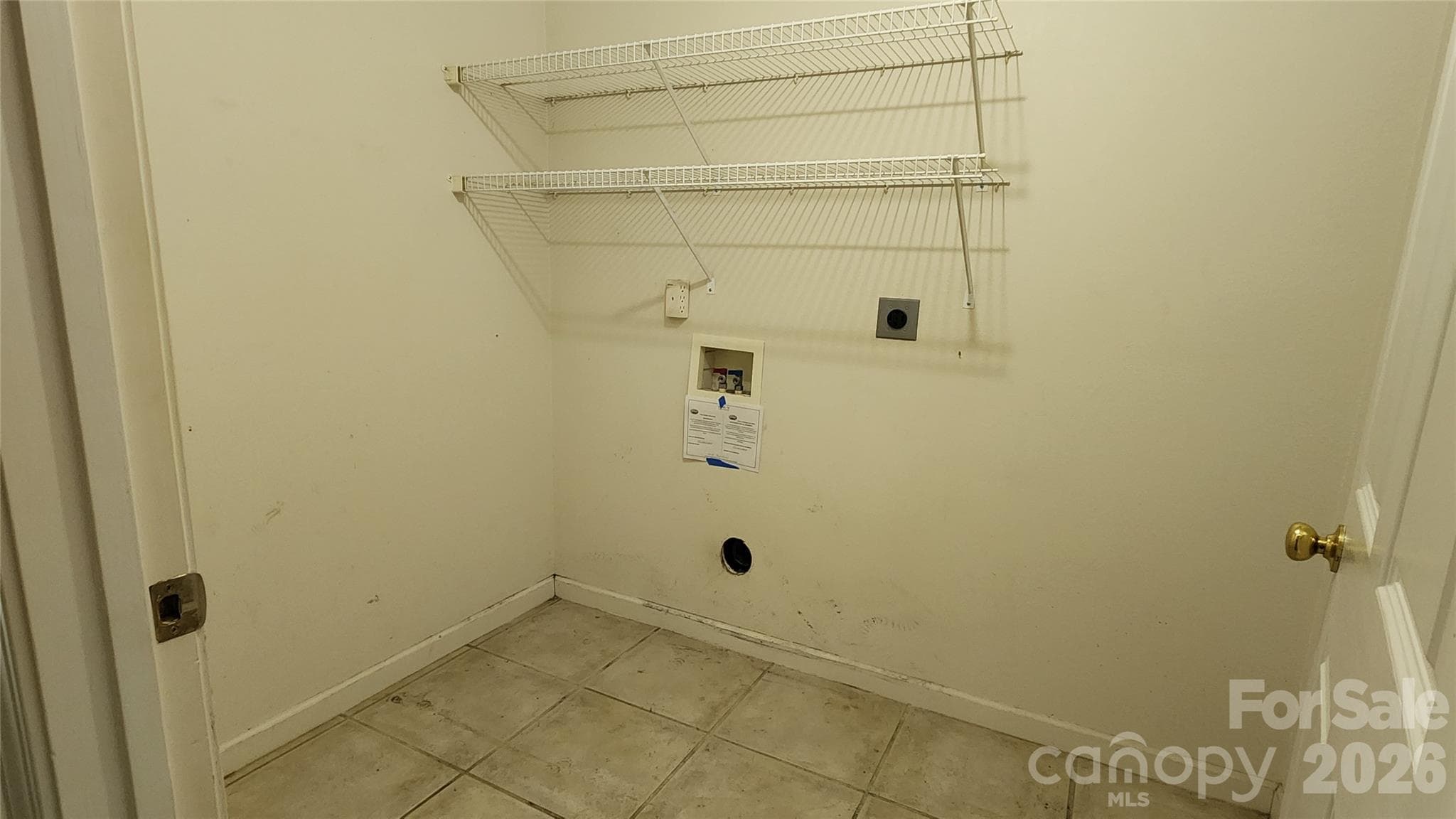 Laundry room in hallway - 200 Park Place, Morganton