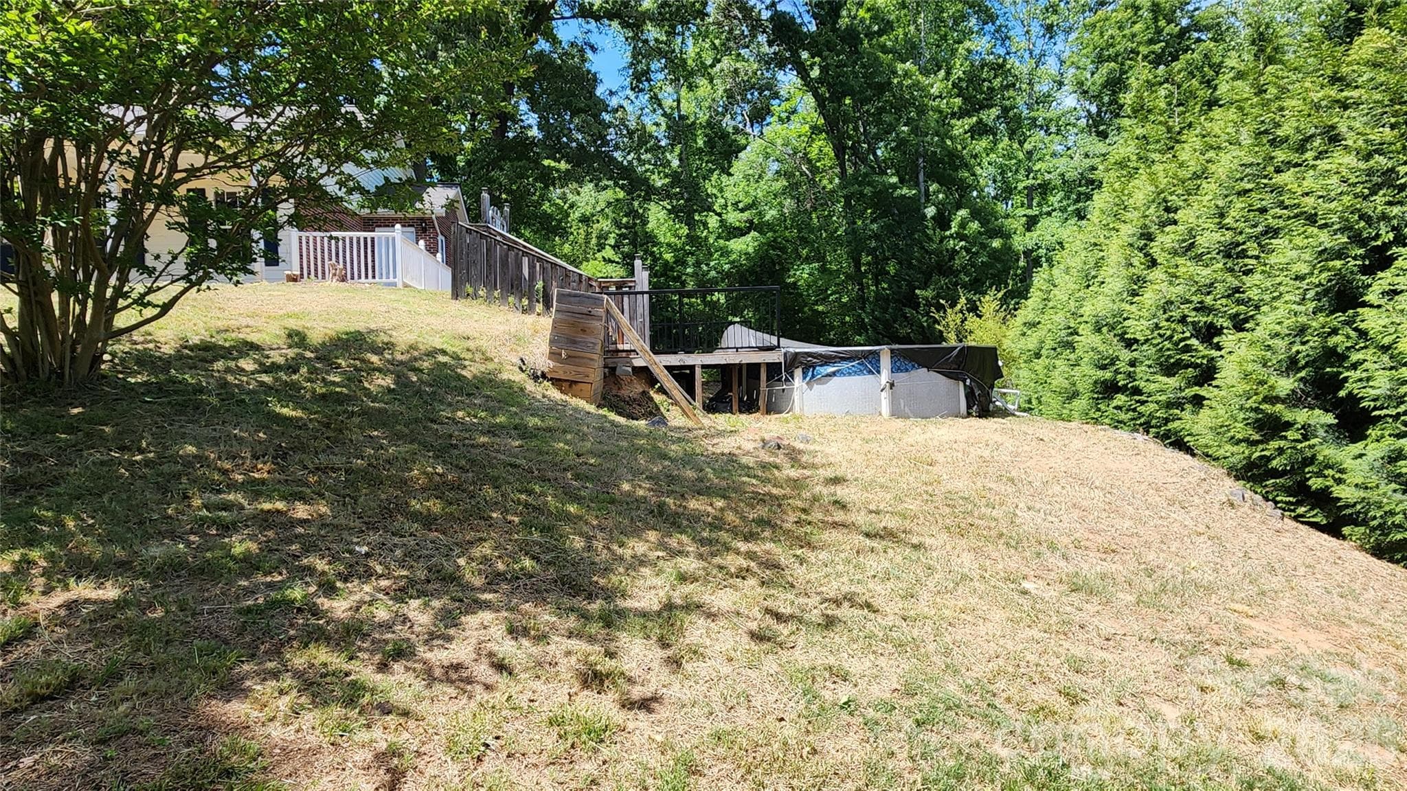 Above ground pool in right side yard - 200 Park Place, Morganton