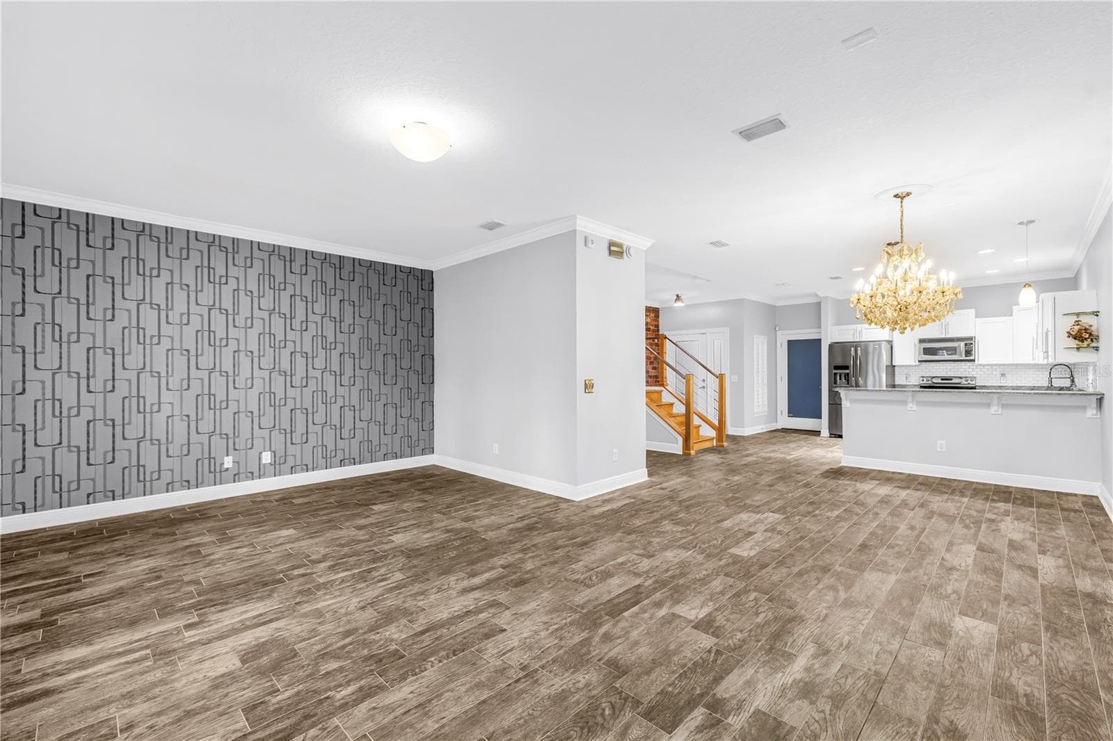 Living area & dining area - 409 BARCELONA DR, ST PETERSBURG