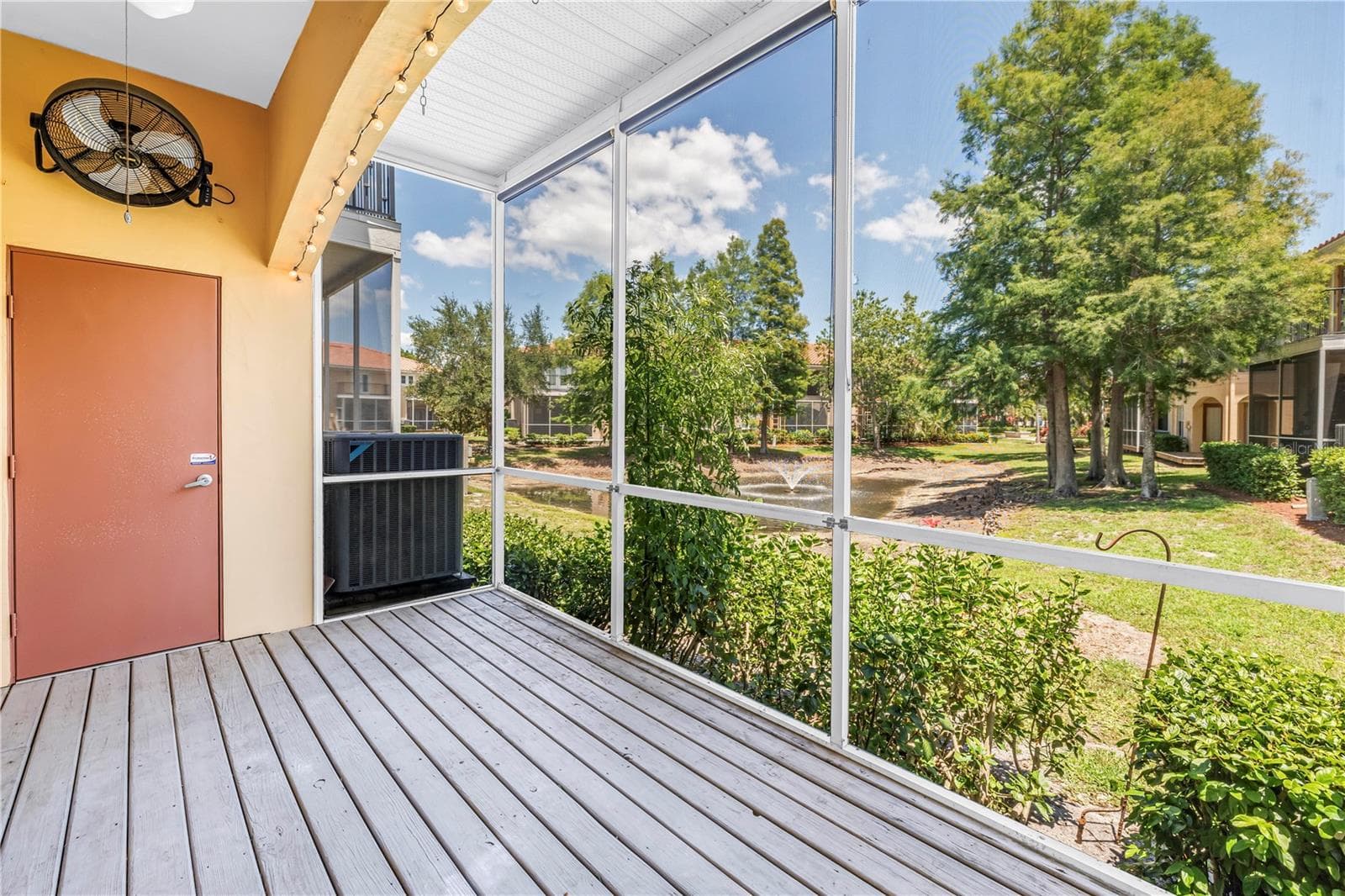 Porch overlooks the pool - 409 BARCELONA DR, ST PETERSBURG