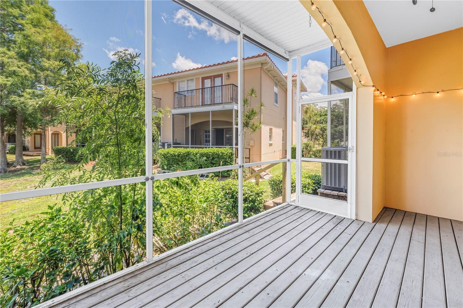 Covered & screened porch - 409 BARCELONA DR, ST PETERSBURG