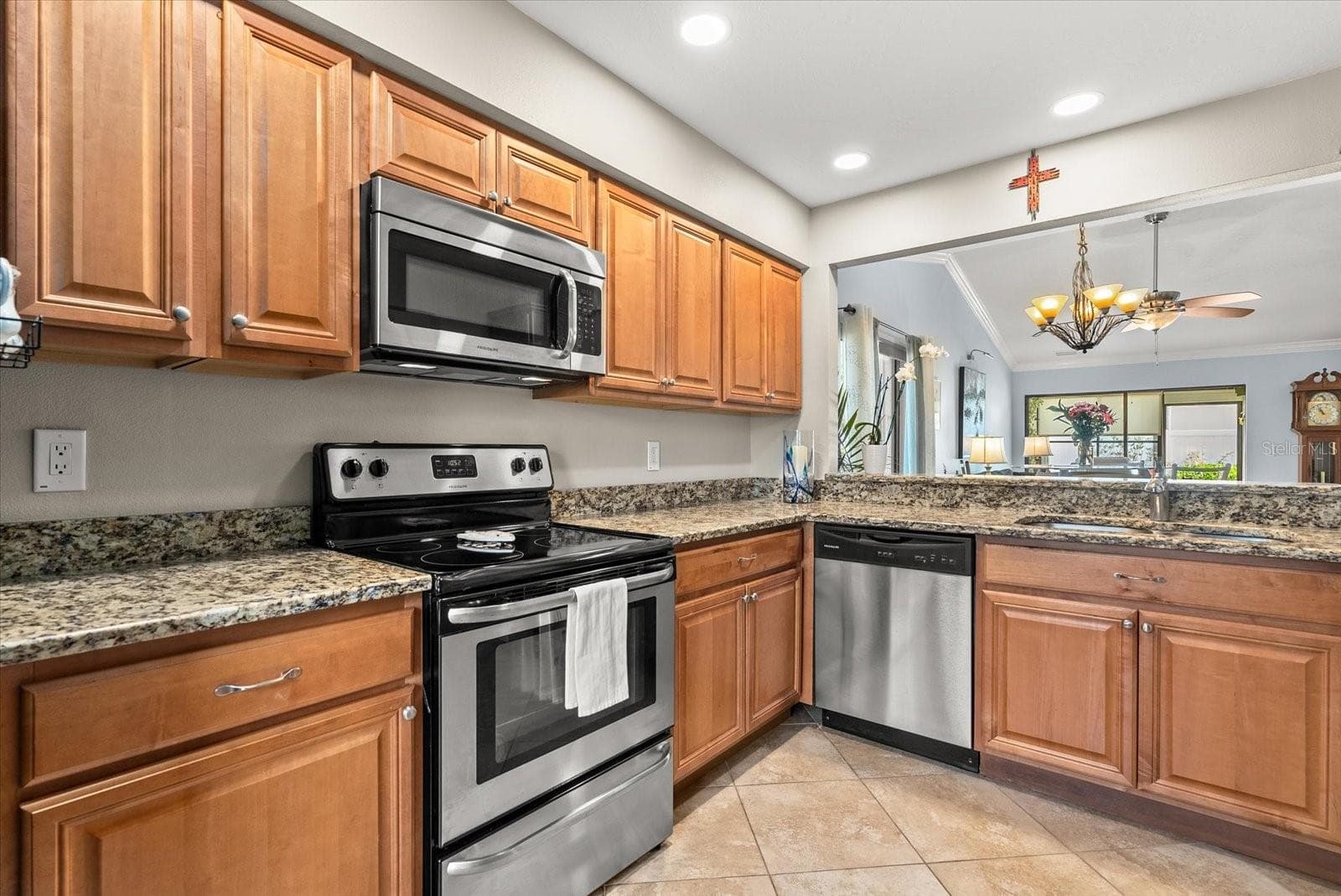 Updated kitchen with newer SS appliances and granite countertops. - 2723 60TH AVENUE DR W #2723, BRADENTON