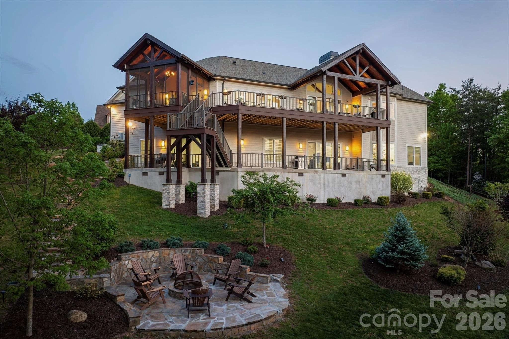 The deep concrete lower level porch spans the back of the house offering a versatile footprint for an outdoor lounge, alfresco dining, a private hot tub retreat, and more.The deep concrete lower level porch spans the back of the house offering a versatile footprint for an outdoor lounge, alfresco dining, a private hot tub retreat, and more.   A propane gas line is run to this area, ready to hook up a grill, gas fire pit, or hot tub - Lenoir