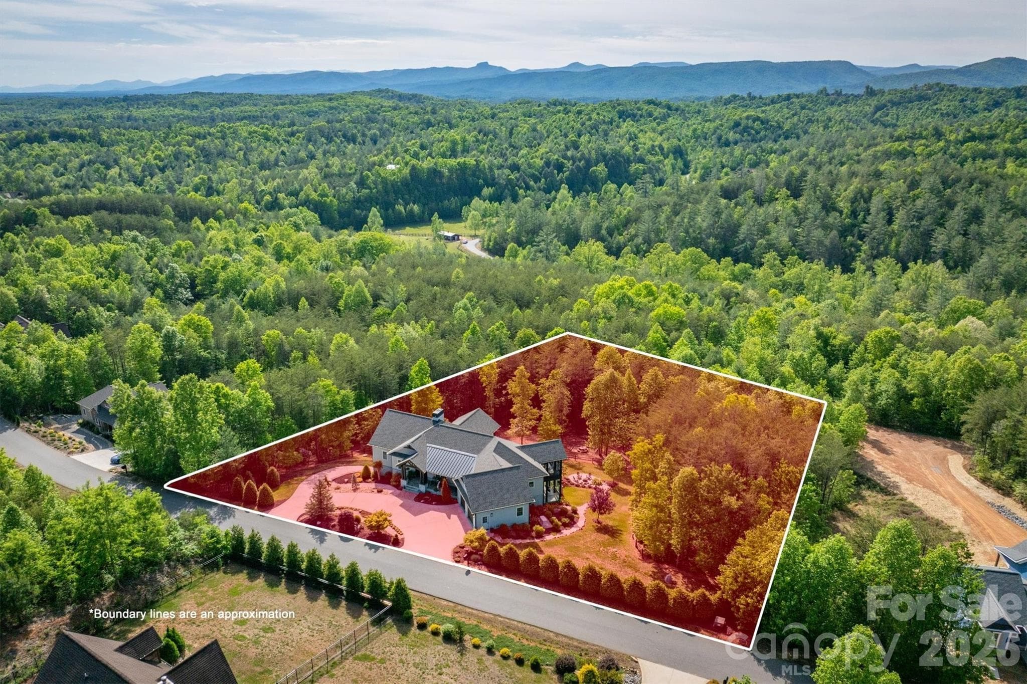 The homes is located in the 3,200 acre gated community, The Coves Mountain River Club - Lenoir
