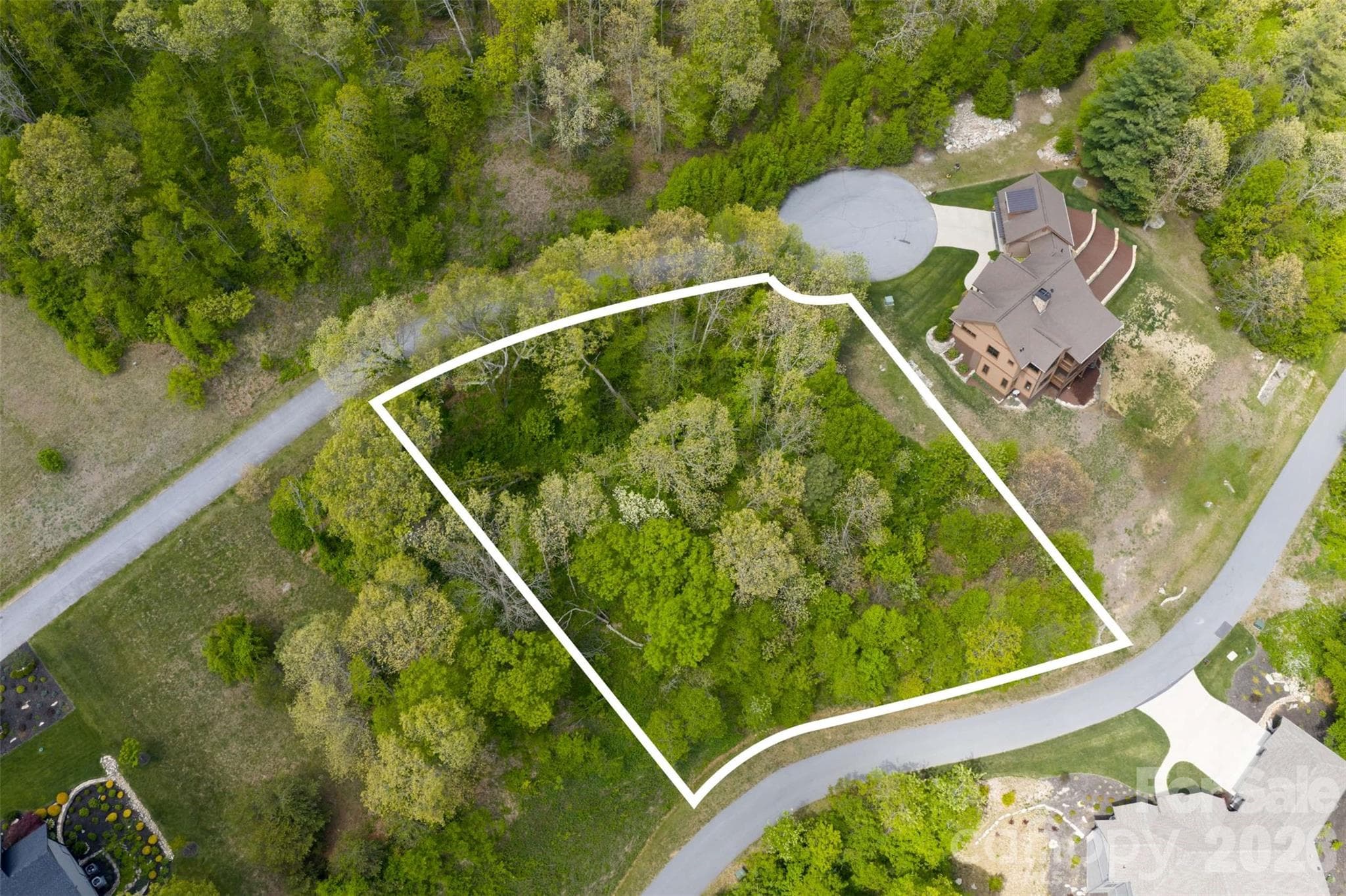 Spring aerial view of the lot and approx dimensions - Hendersonville