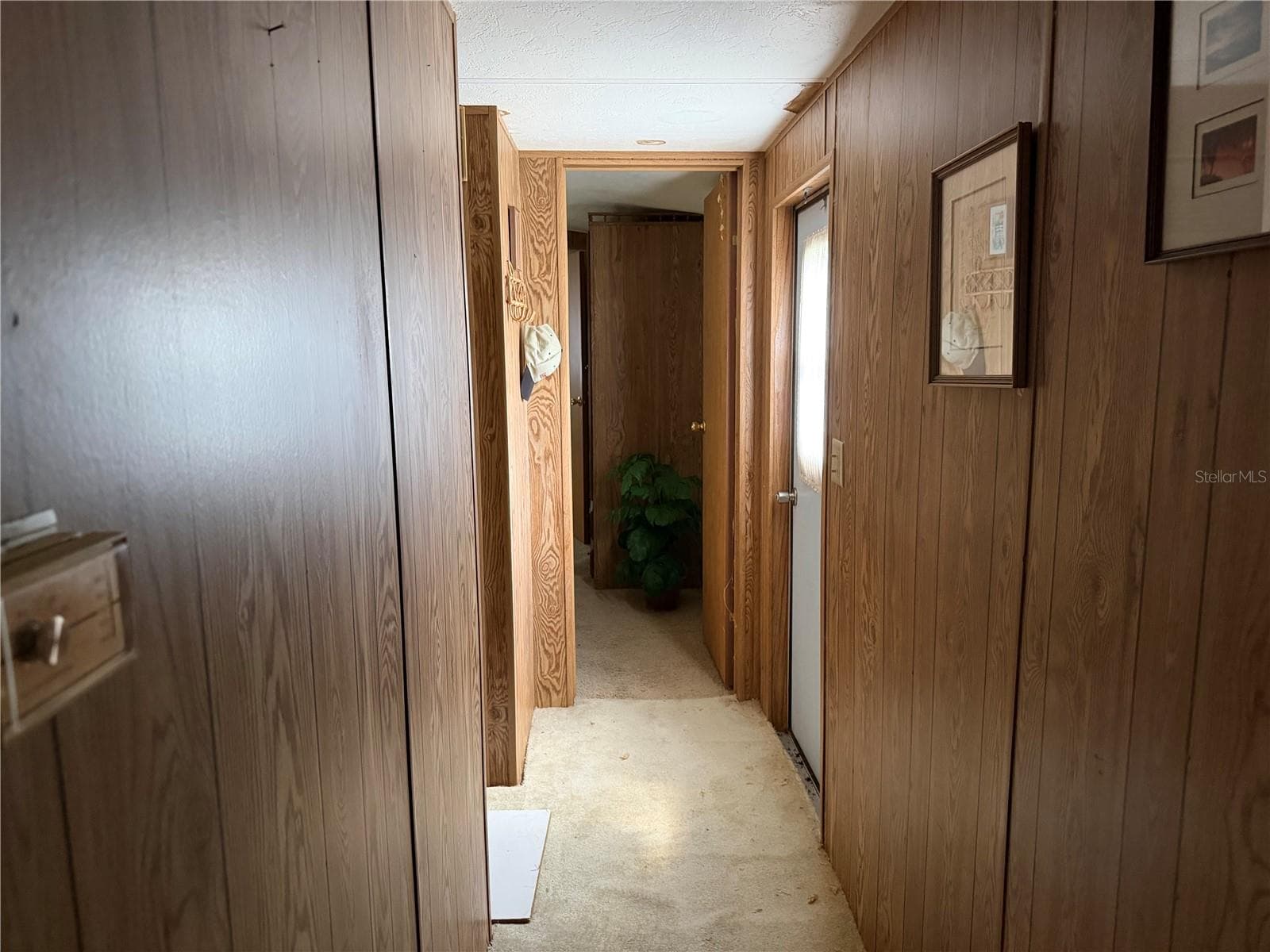 Hallway to bedrooms - 13440 PALM DR #7, ASTATULA