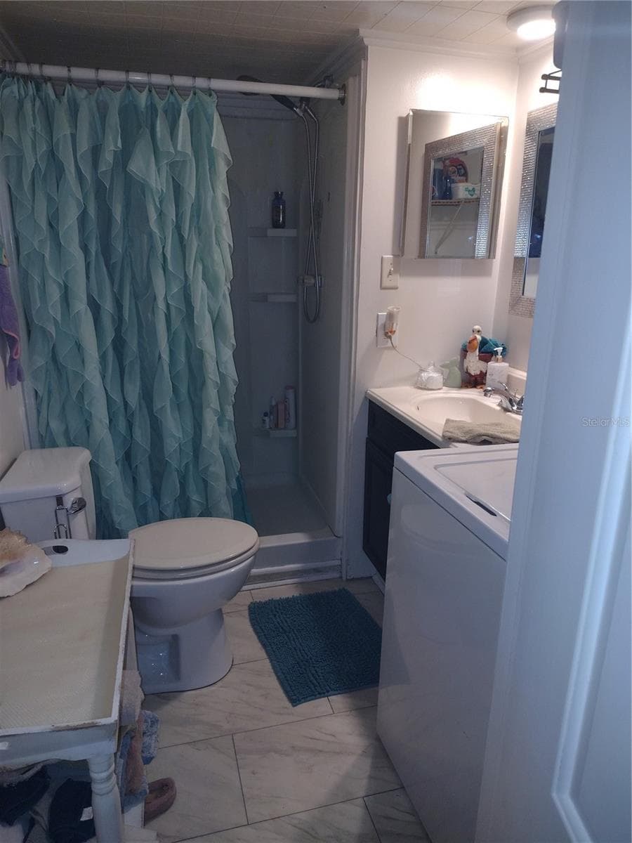 Bathroom in hall way  of Mobile Home - 37748 MARKLAND AVE, ZEPHYRHILLS