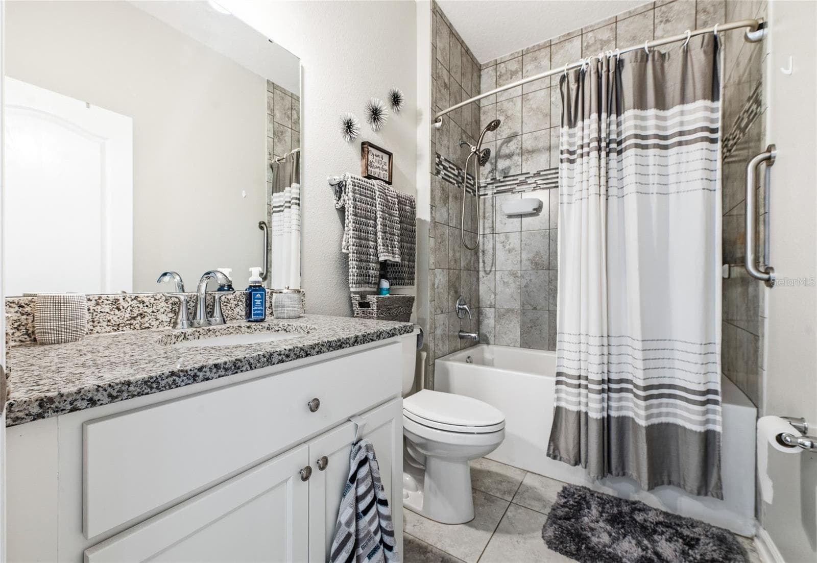 Guest bathroom with full tile - 31 OLIVINE CT, ST AUGUSTINE