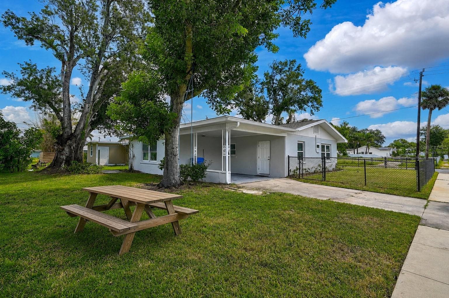Side Lot Virtually Staged - 102 20TH ST NE, BRADENTON