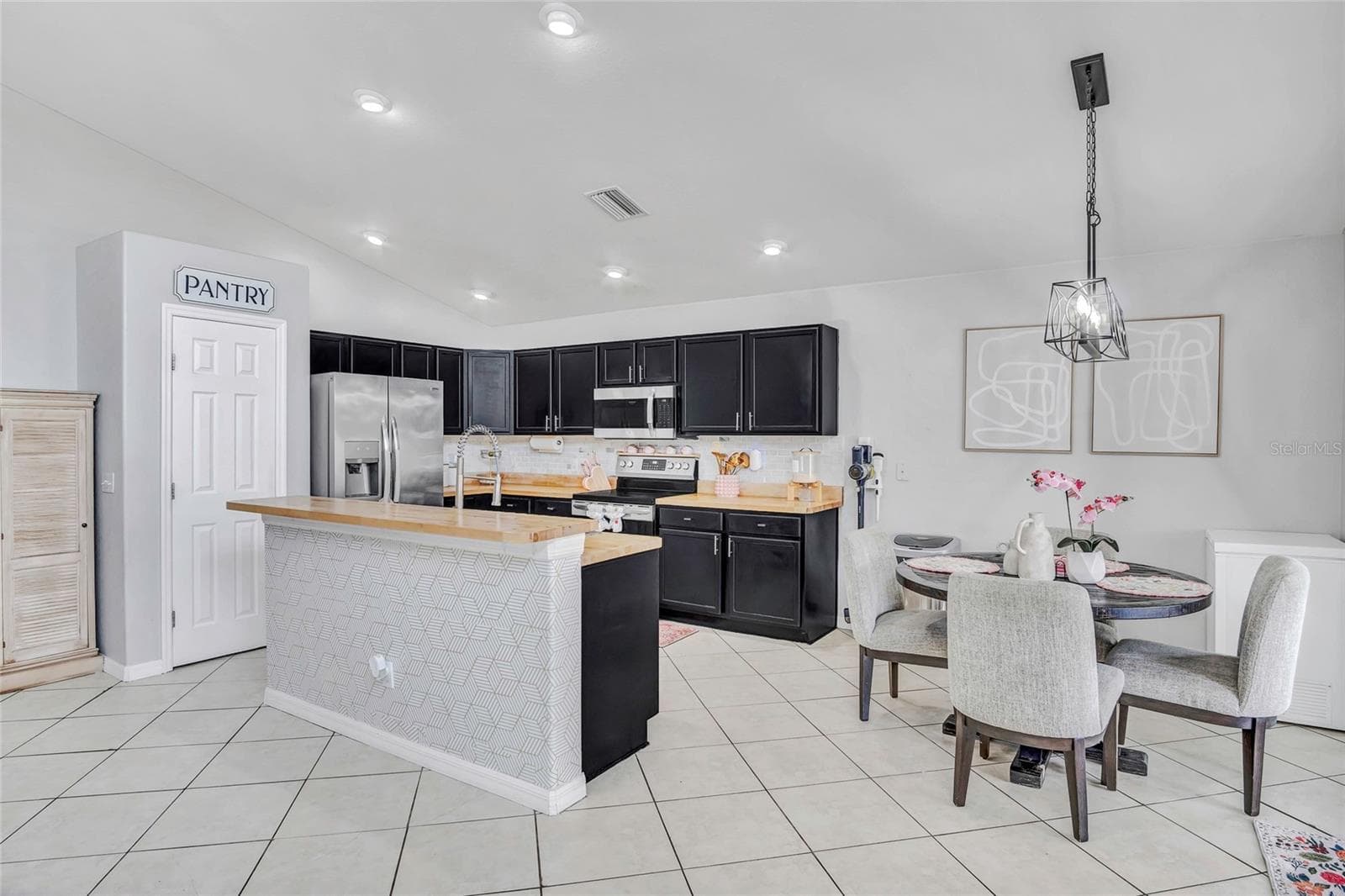 Kitchen and dining area view - 8335 ADELE RD, LAKELAND