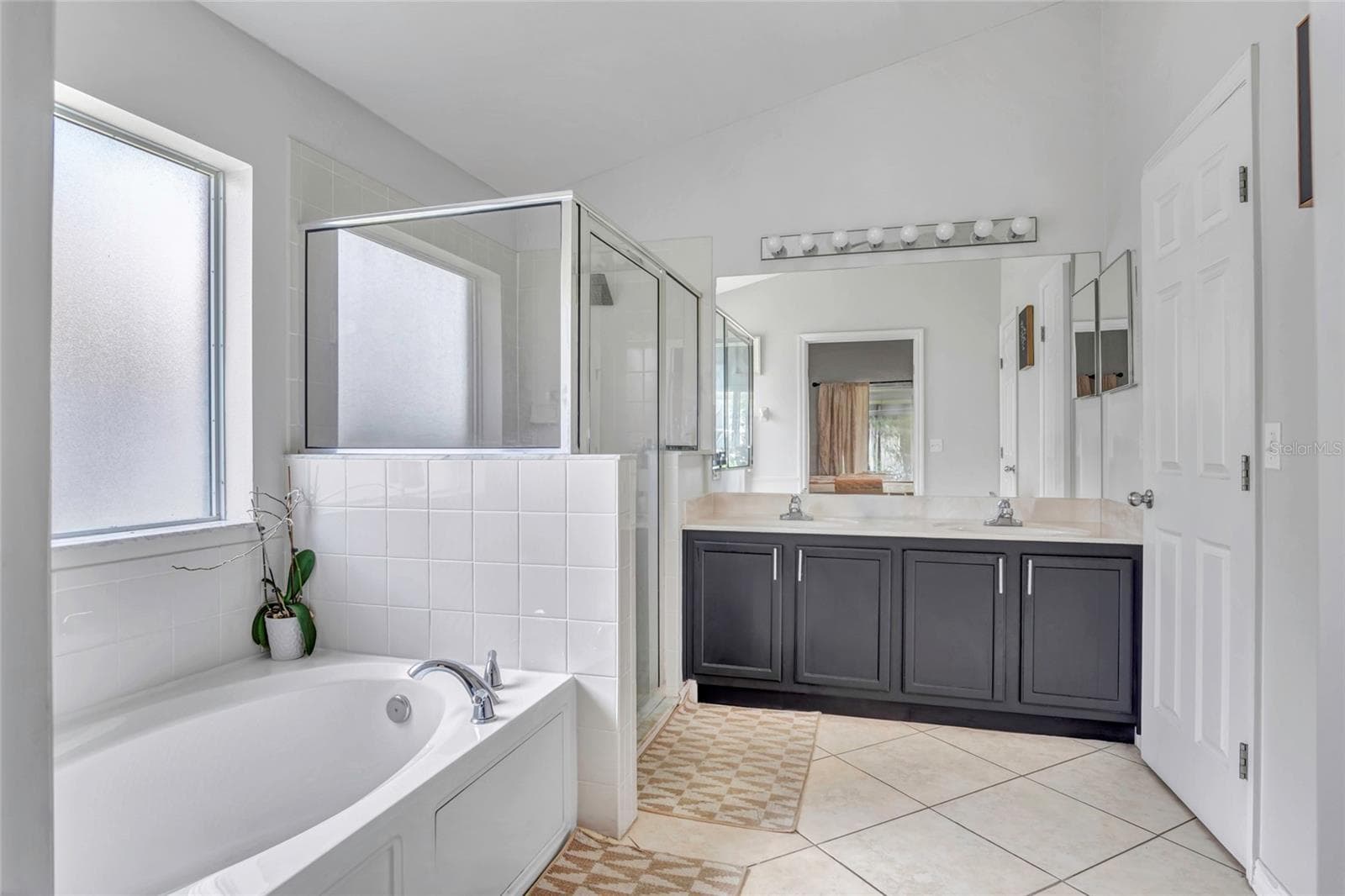 Primary bathroom with soaking tub. - 8335 ADELE RD, LAKELAND