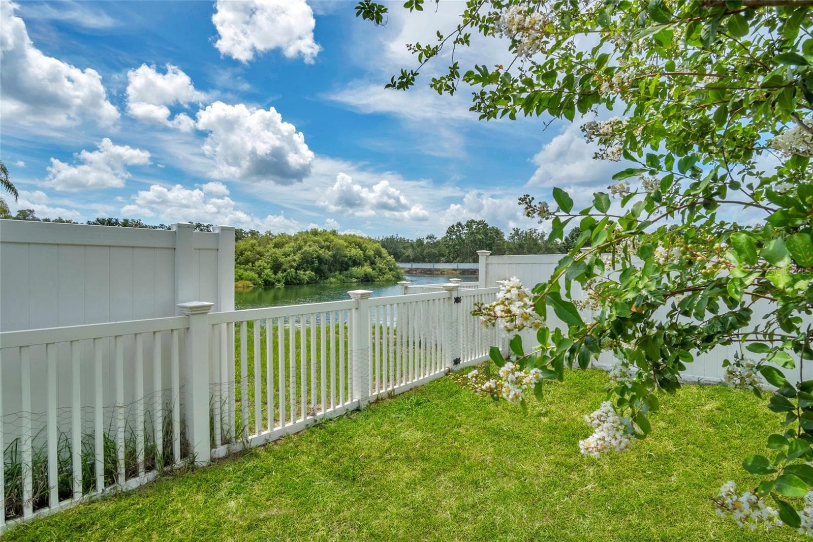 Backyard angle of water view. - 8335 ADELE RD, LAKELAND