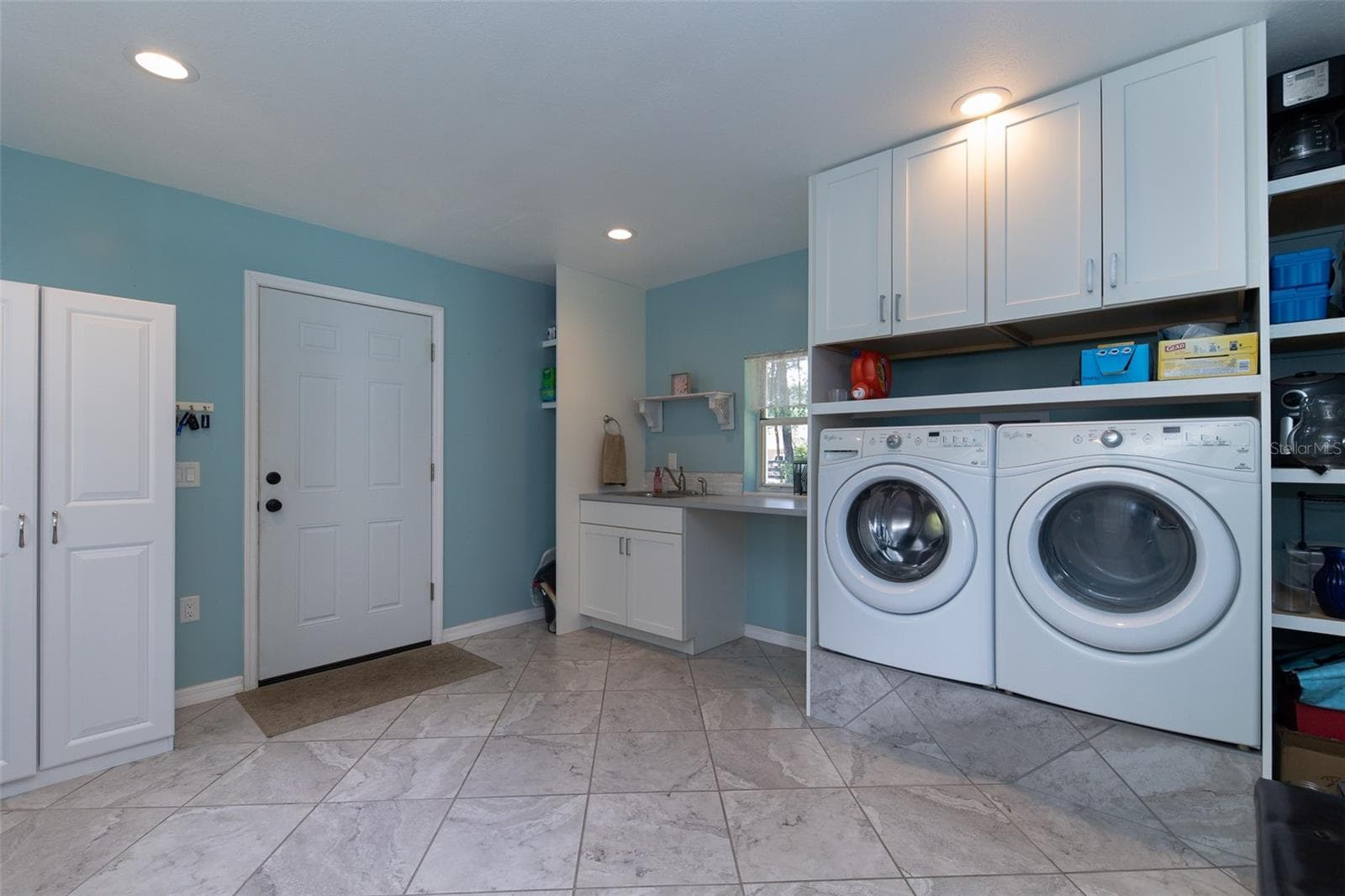 Laundry Room with Garage Access - 39 WOOD RIDGE DR, OCALA