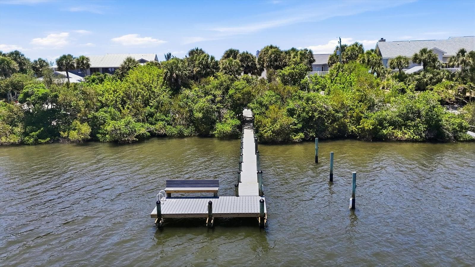 Enjoy watching the boats cruise along from your newer dock on the Bay - 750 N MANASOTA KEY RD, ENGLEWOOD