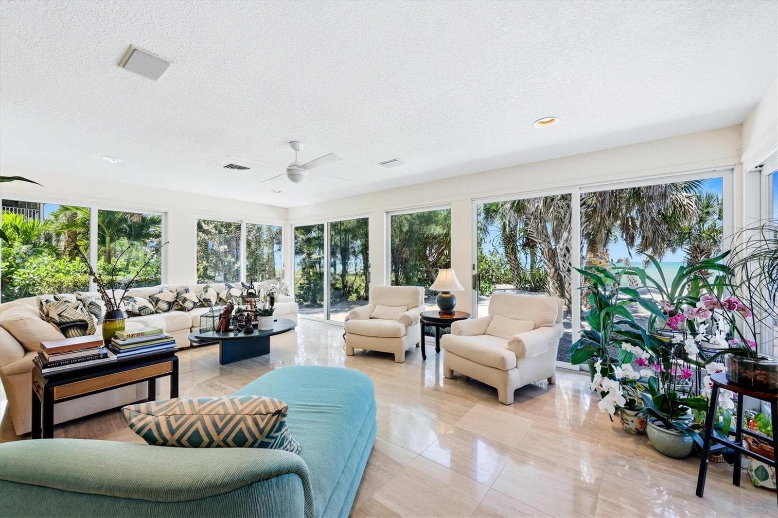Extended living room/family room has panoramic views overlooking the Gulf - 750 N MANASOTA KEY RD, ENGLEWOOD