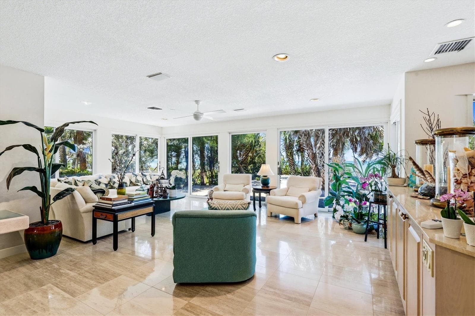 Extended seating area accomodates guests & family - 750 N MANASOTA KEY RD, ENGLEWOOD