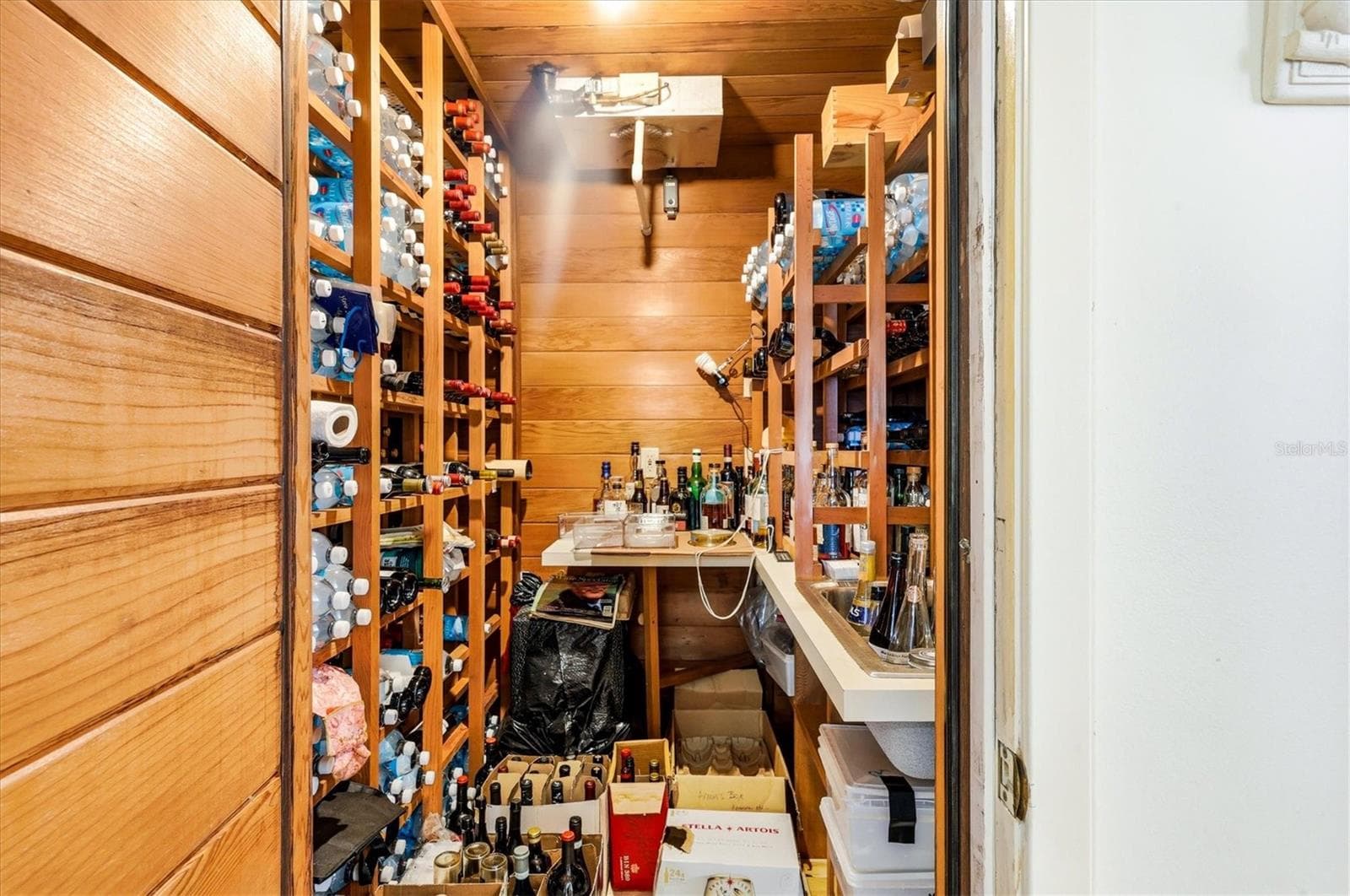 Built in wine chiller/cellar in kitchen - 750 N MANASOTA KEY RD, ENGLEWOOD