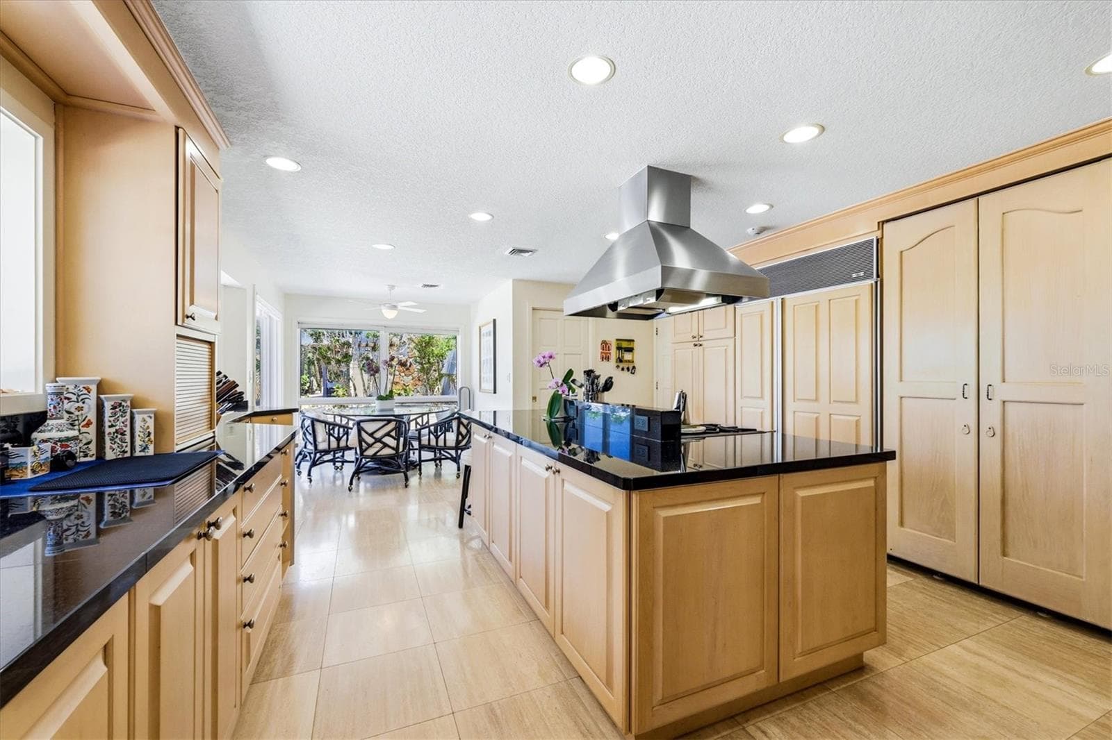 Kitchen has a spacious island and wine closet - 750 N MANASOTA KEY RD, ENGLEWOOD