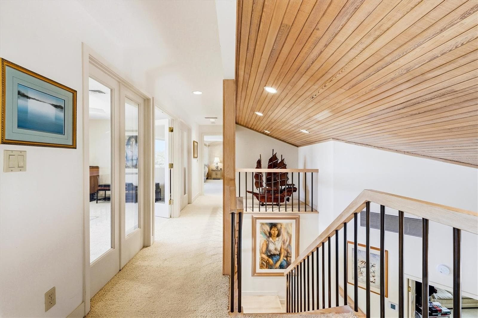 Stairway to upper level - 750 N MANASOTA KEY RD, ENGLEWOOD