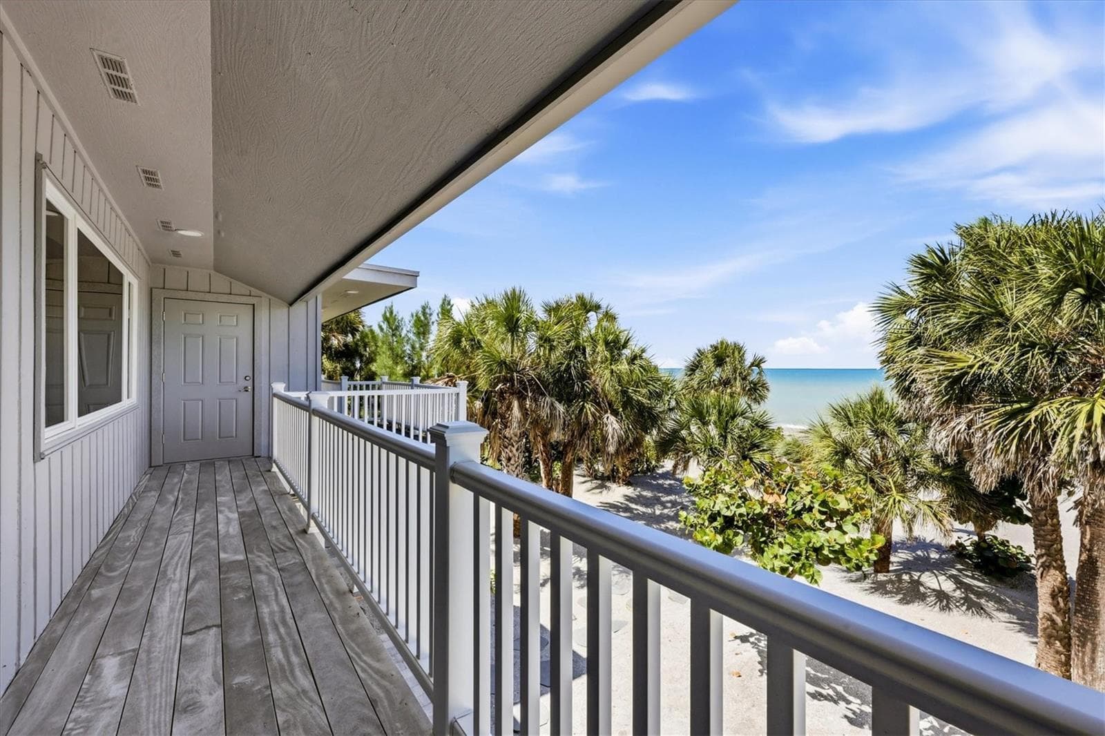 Ipe decking compliments balcony - 750 N MANASOTA KEY RD, ENGLEWOOD