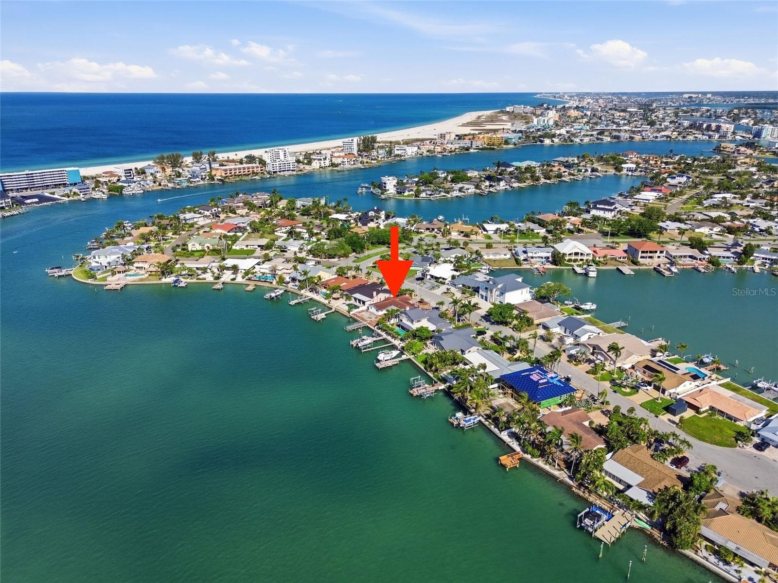 Drone view indicating 4 Bellevue Drive with the Intracoastal and Devil's Elbow on the left and the Gulf waters and beaches to the west above. - 4 BELLEVUE DR, TREASURE ISLAND
