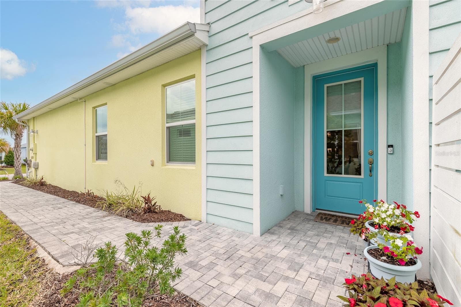 Upscale paver driveway and walkway to entry - 230 SAND BAR LN, DAYTONA BEACH