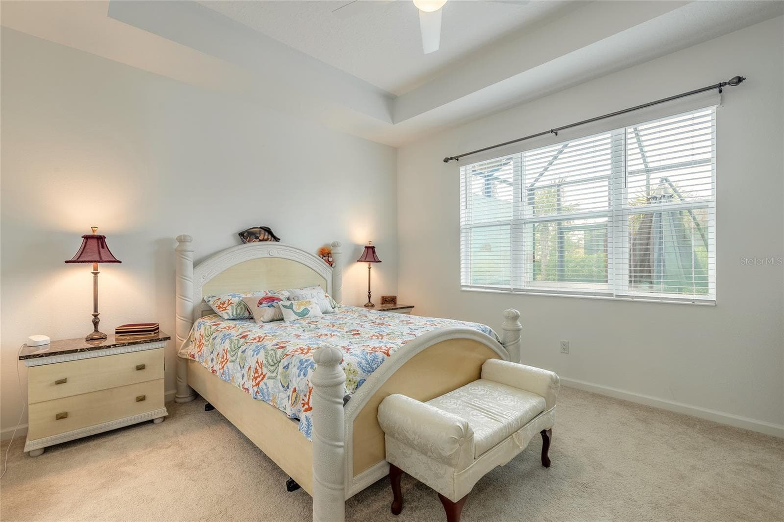 Spacious primary bedroom with lots of natural light - 230 SAND BAR LN, DAYTONA BEACH