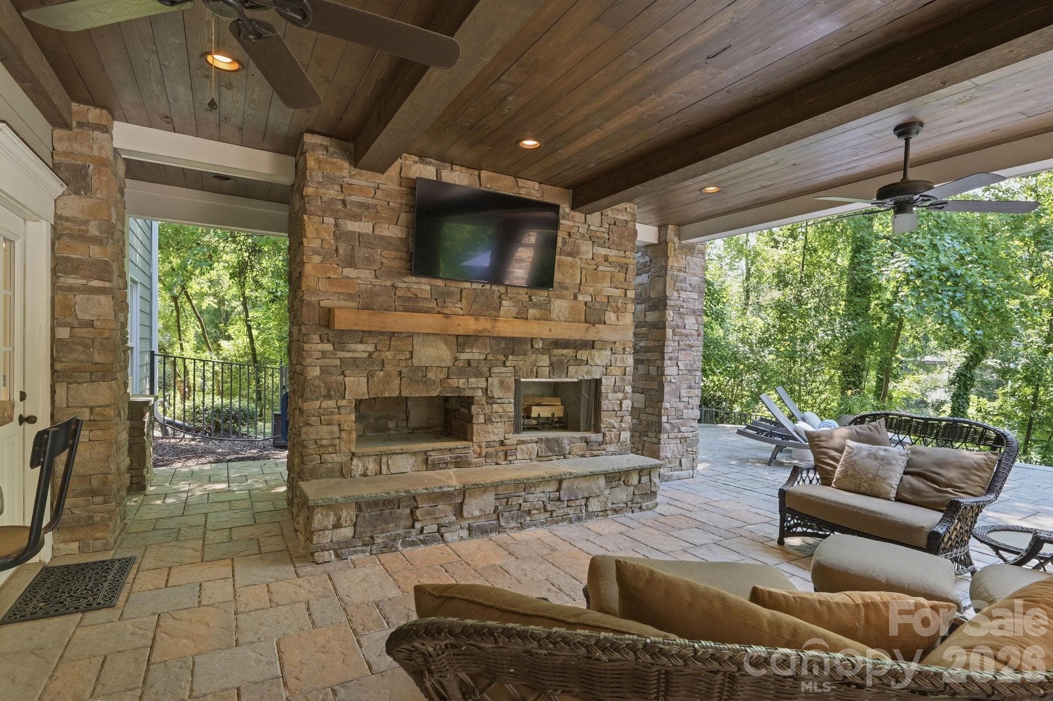 Lower level fire place and entertainment area - 235 Grey Road, Davidson
