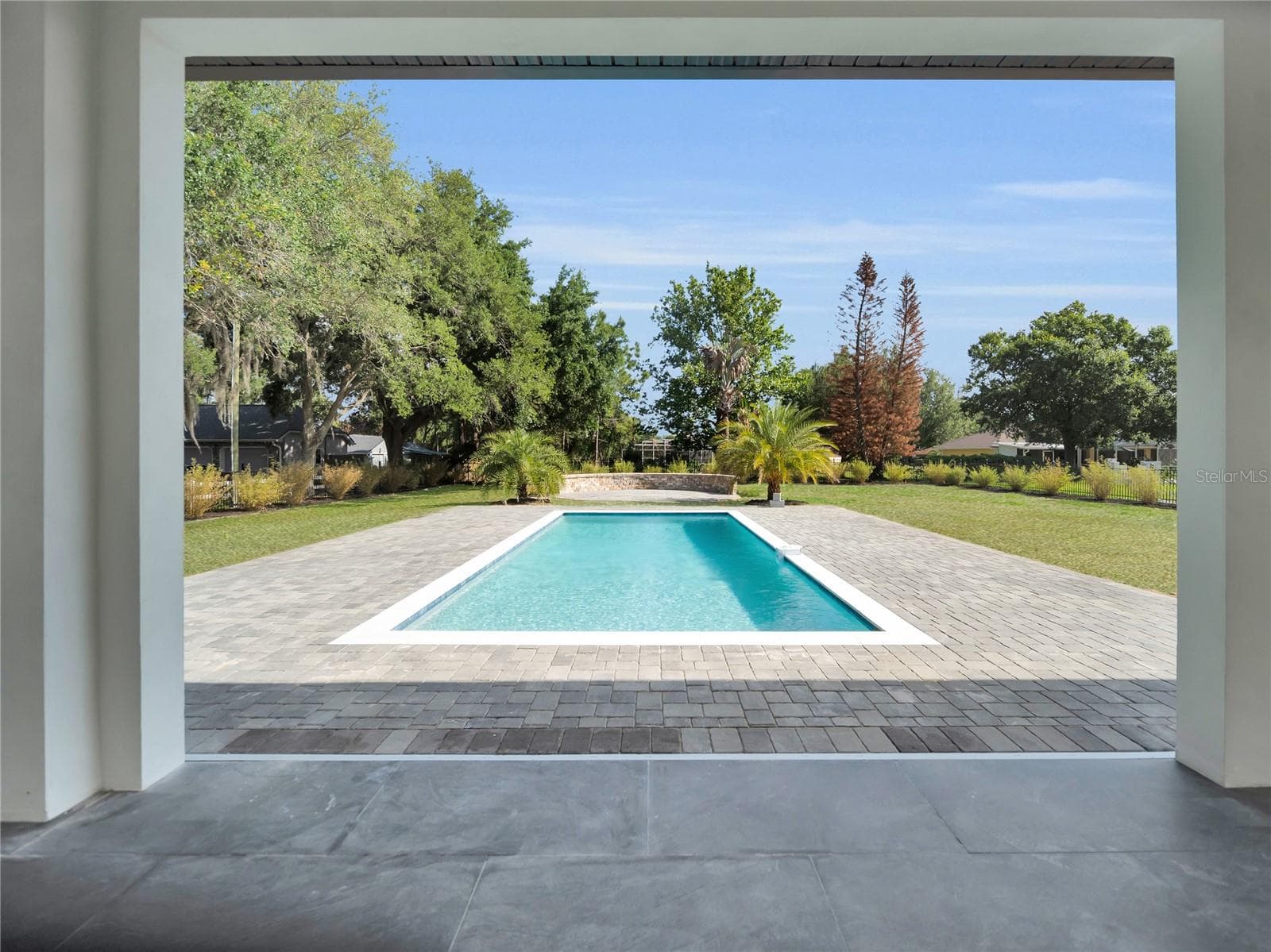 Covered lanai with pool views - 11241 OSWALT RD, CLERMONT