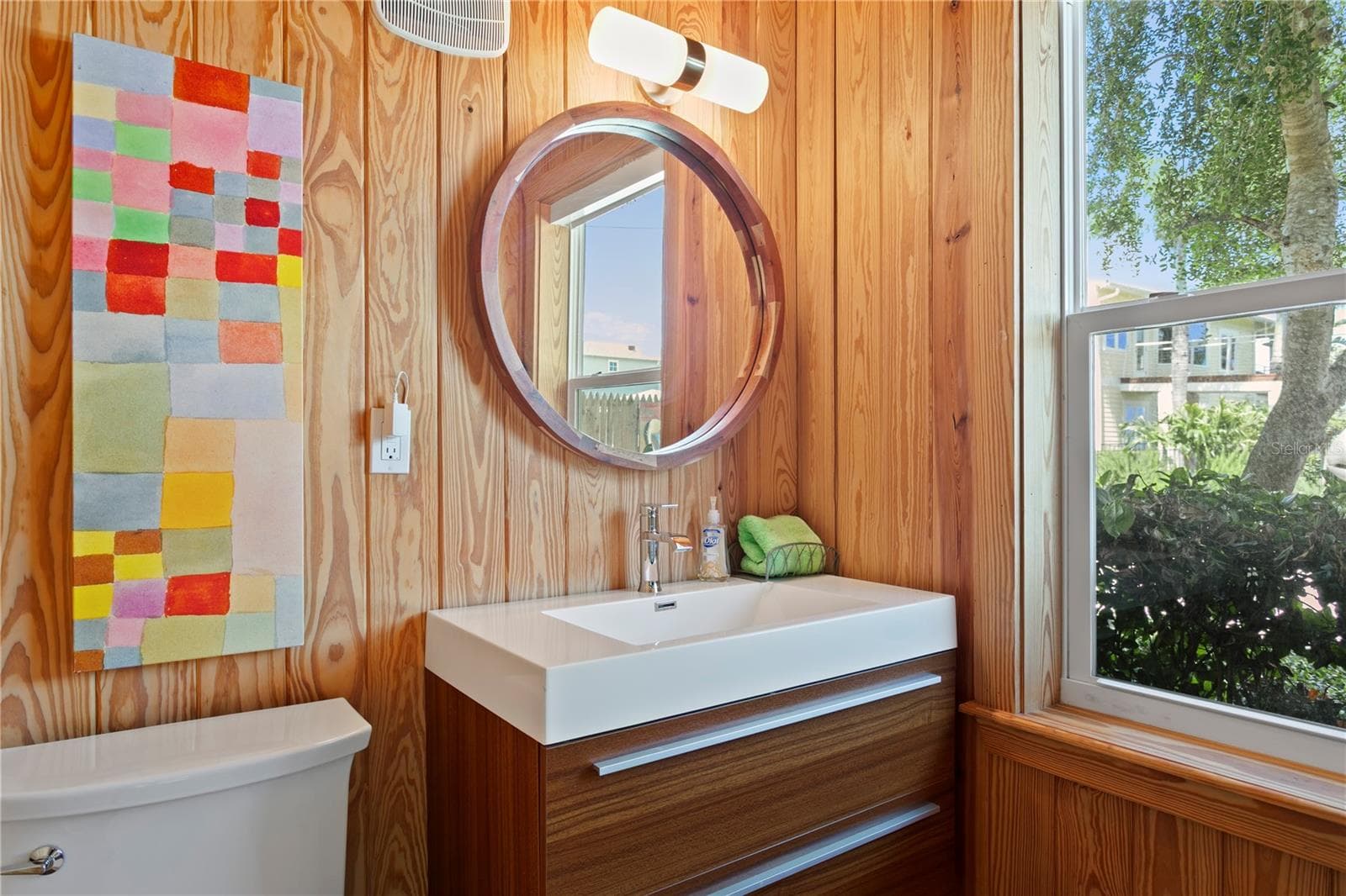 Half bath in gym. - 1803 BEACH DR SE, ST PETERSBURG