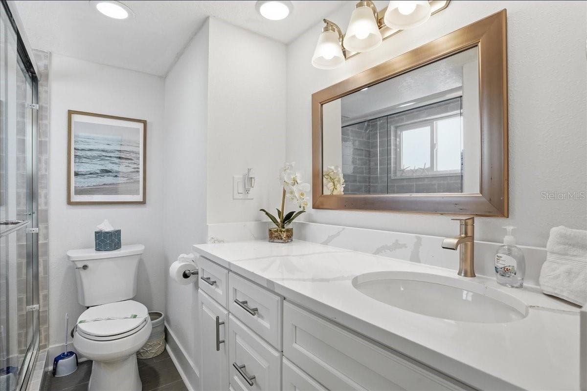Primary ensuite bath - 8911 BLIND PASS RD #118, ST PETE BEACH