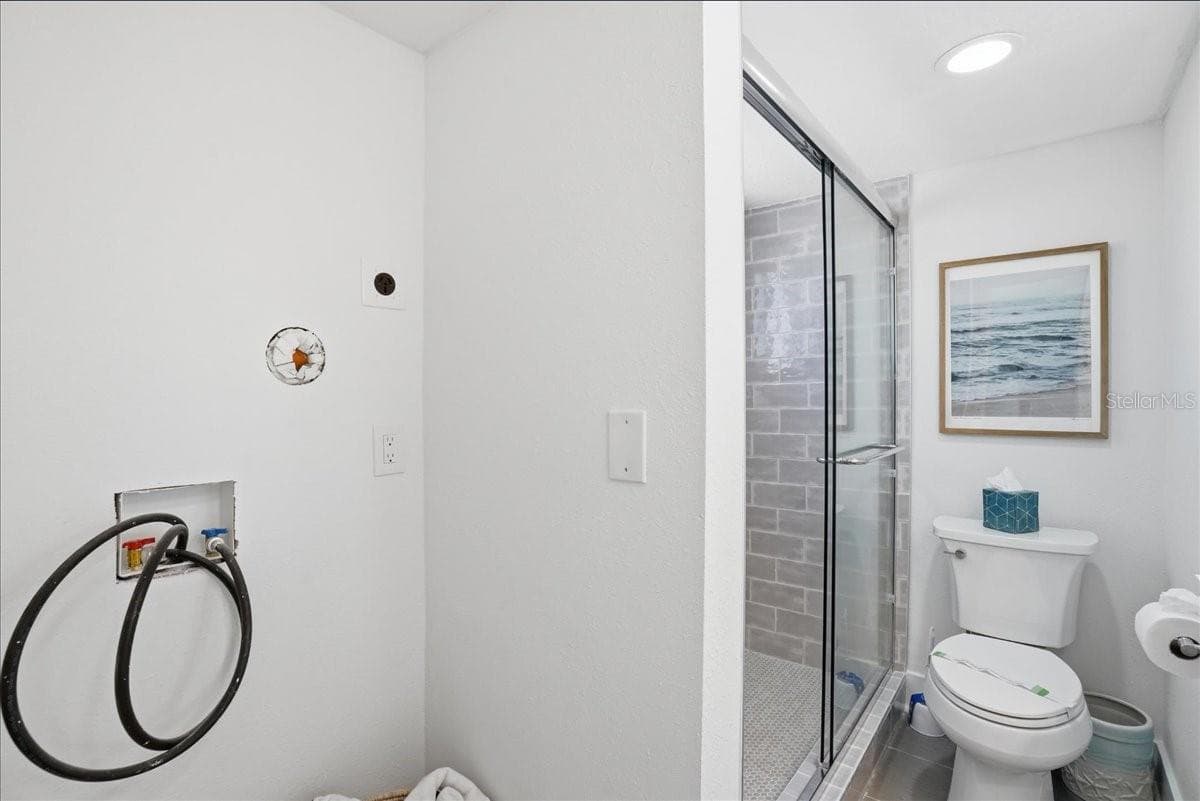 Washer Dryer hook up in primary bath - 8911 BLIND PASS RD #118, ST PETE BEACH