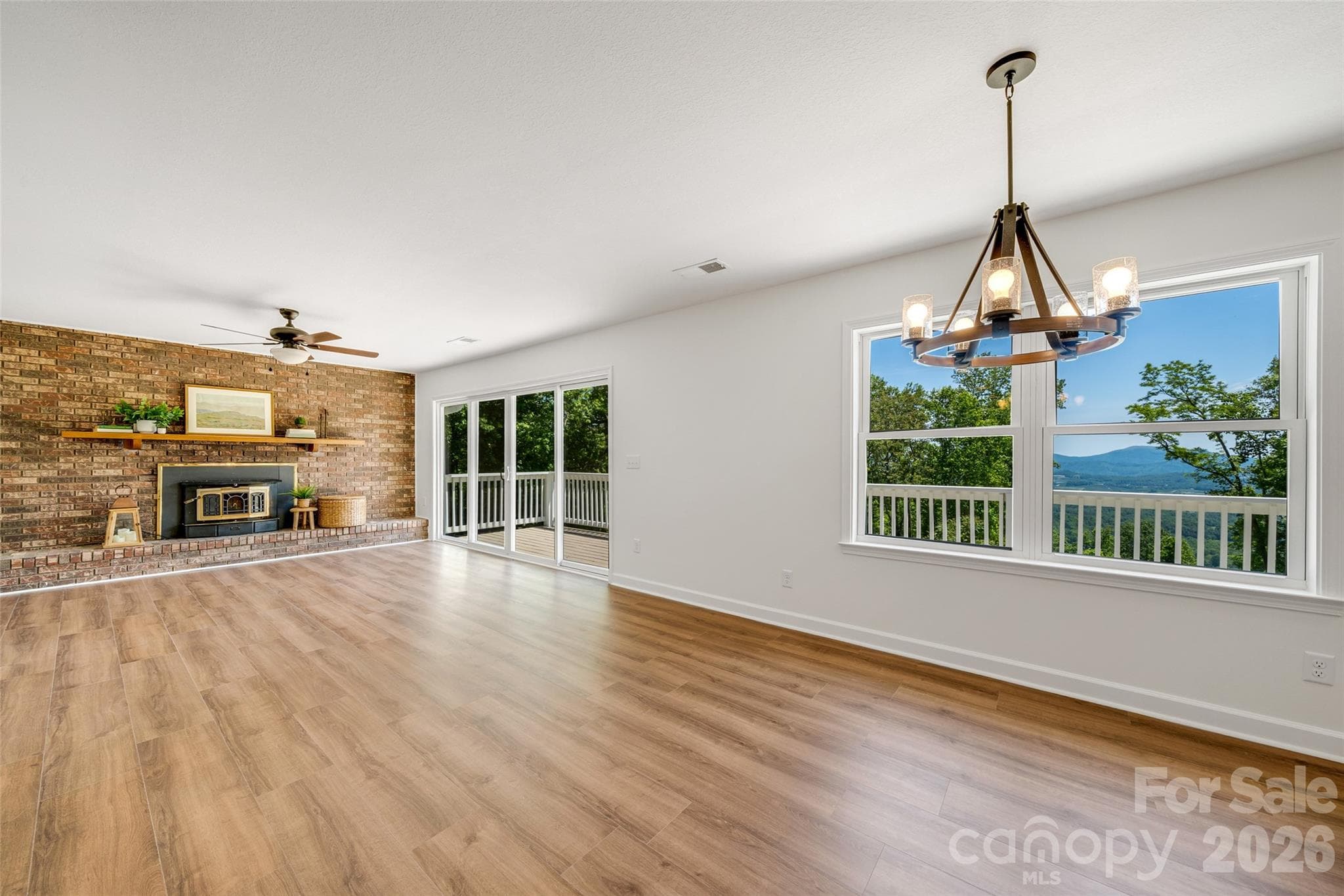 Dining area and living area with a spectacular mountain view - 69 Milburn Lane, Hendersonville