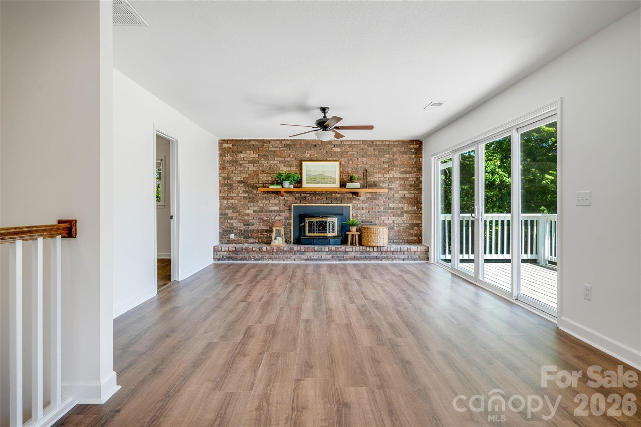 Brand new slider doors welcome in bright, natural light - 69 Milburn Lane, Hendersonville